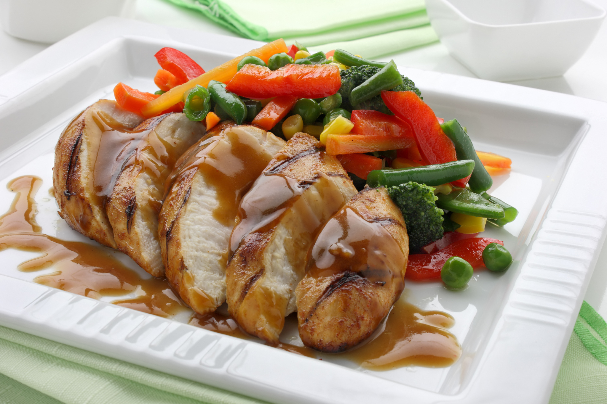 chicken breast with vegetables and sauce
