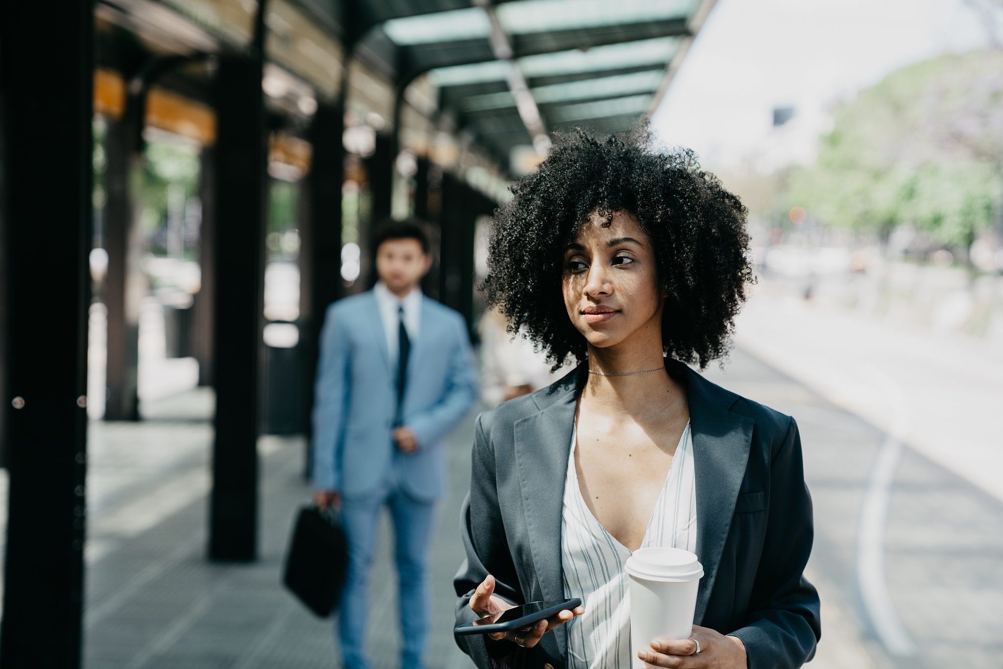 businesswoman with afro hair in the city