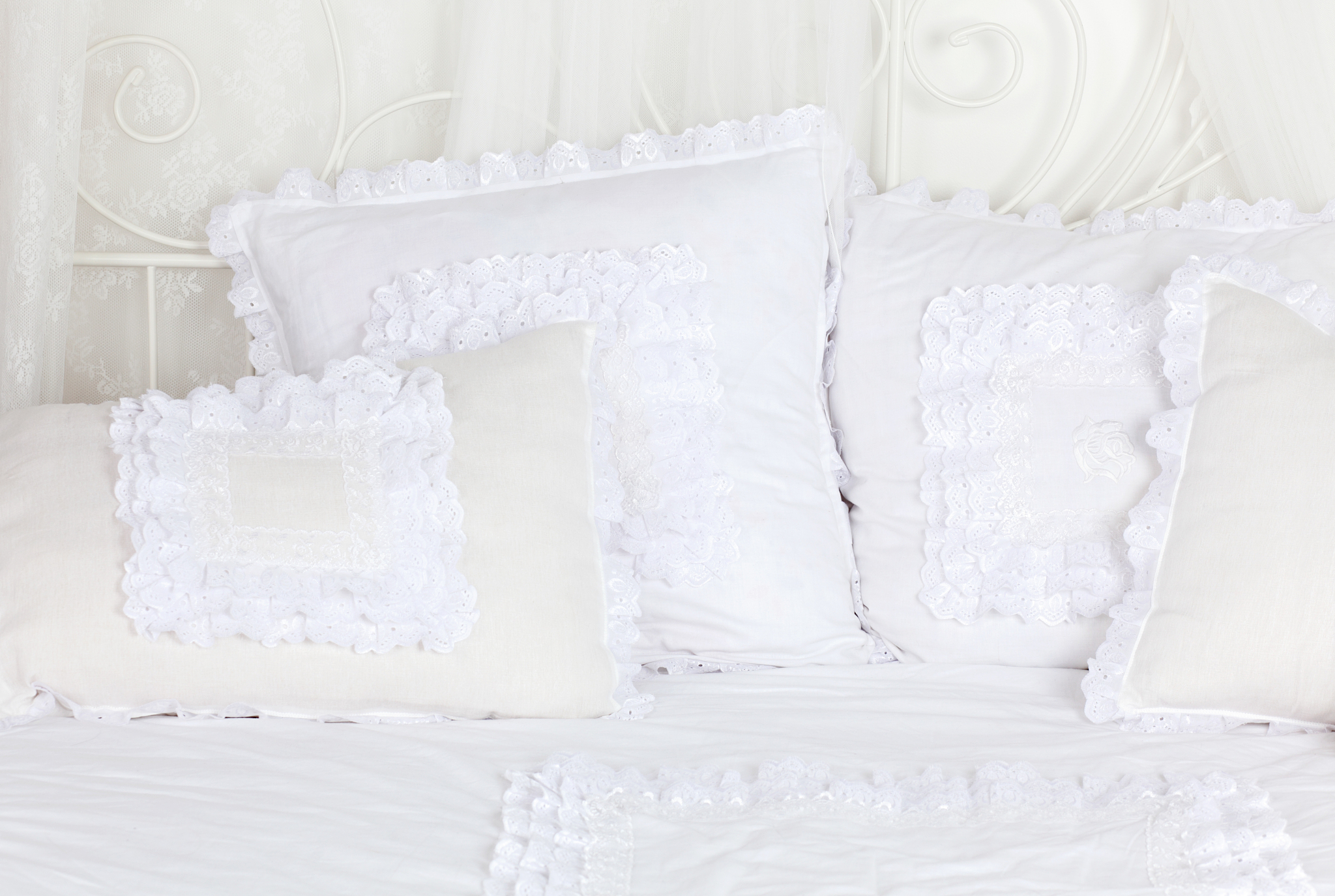 beautiful and soft white laced pillows