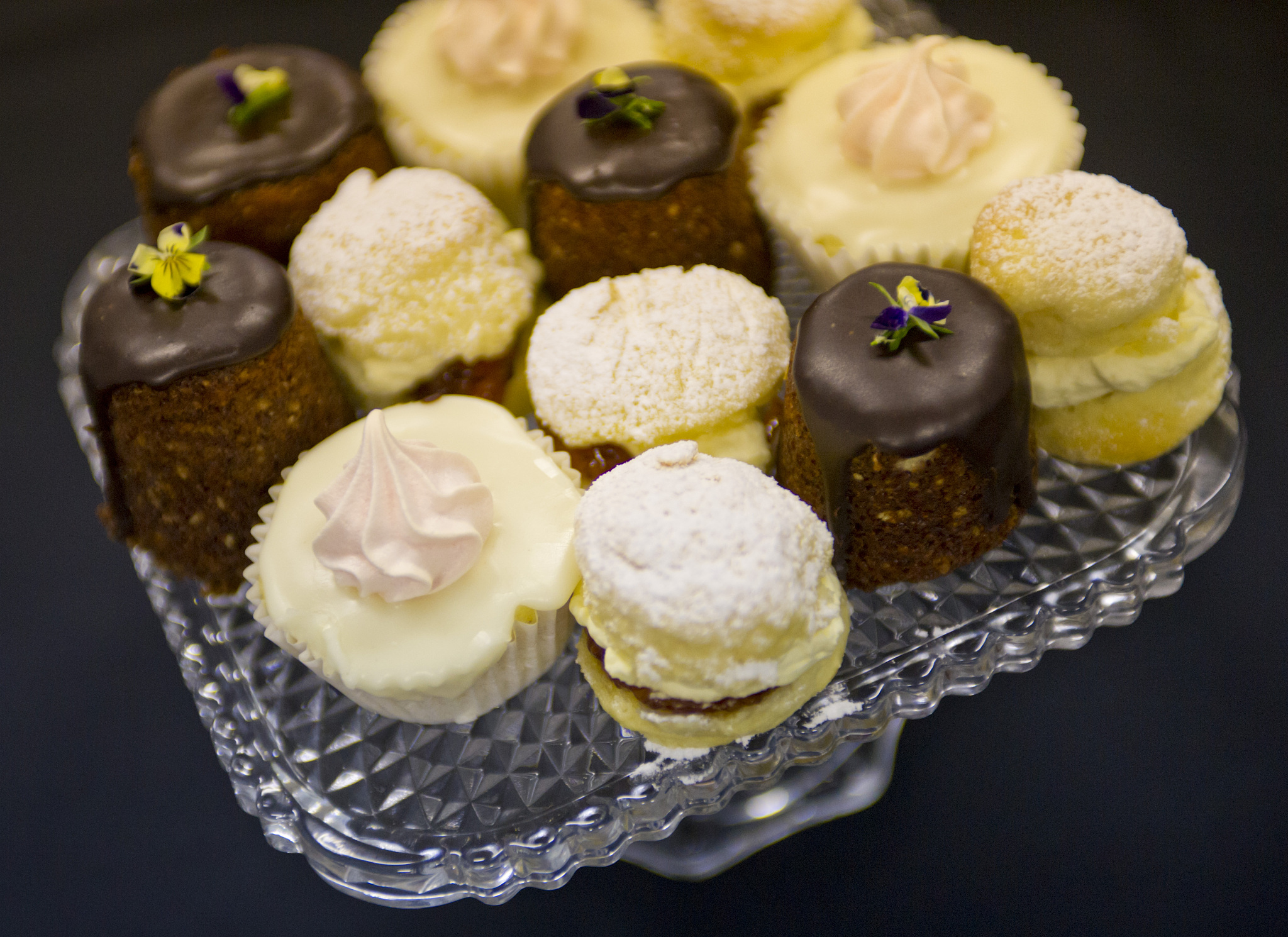 platter of small cakes