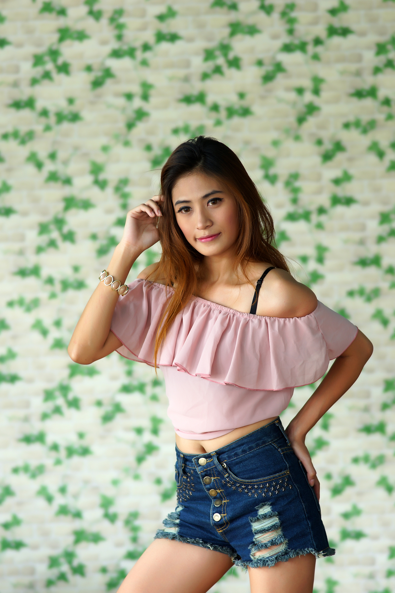 beautiful young woman posing alone in the cafe