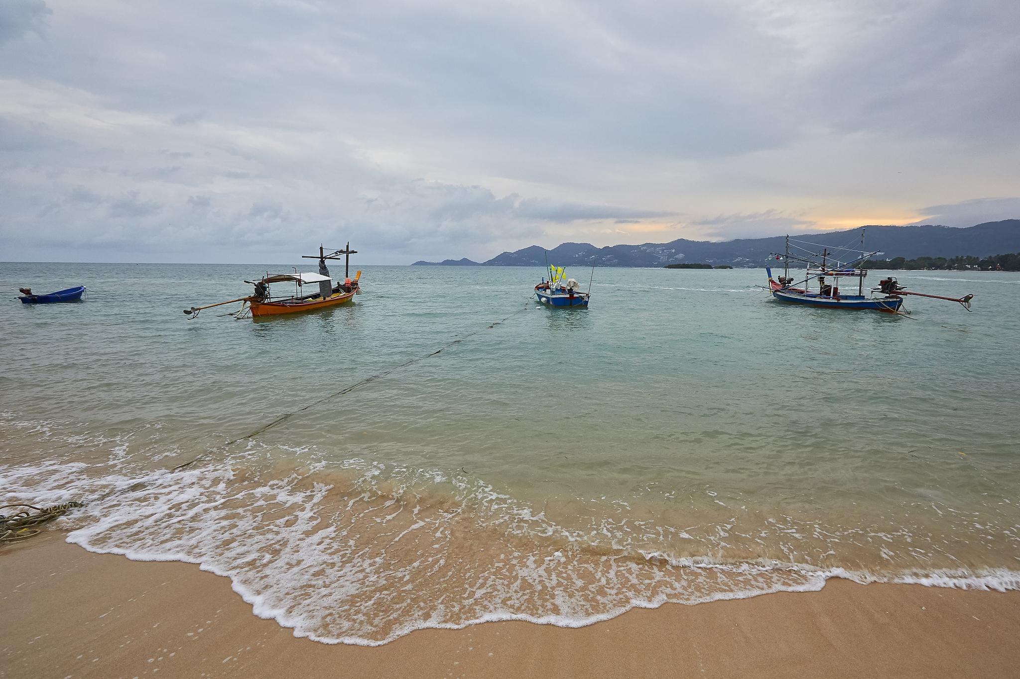 traditional wooden thai fishing boats
