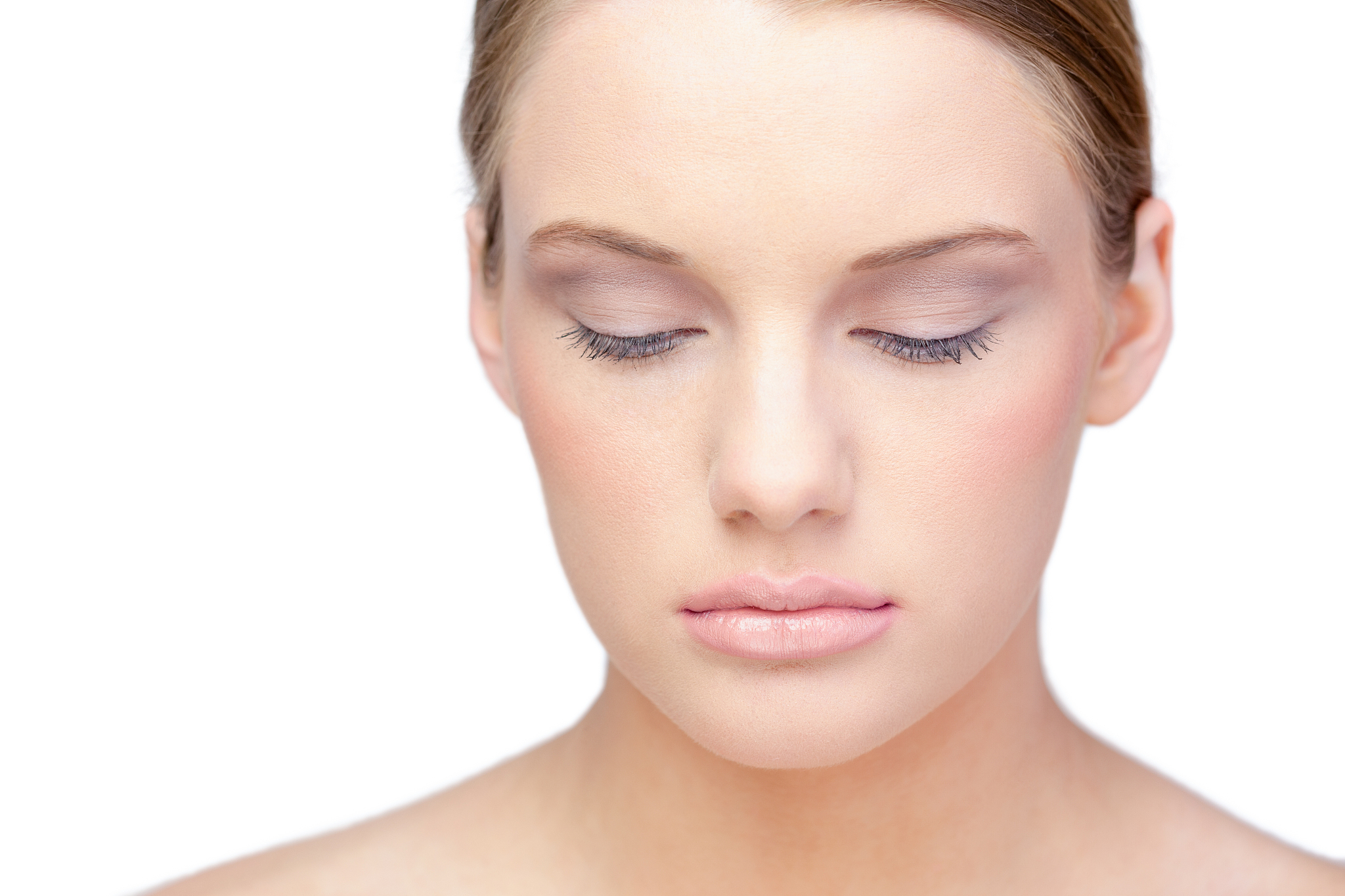 content blonde model wearing natural make up
