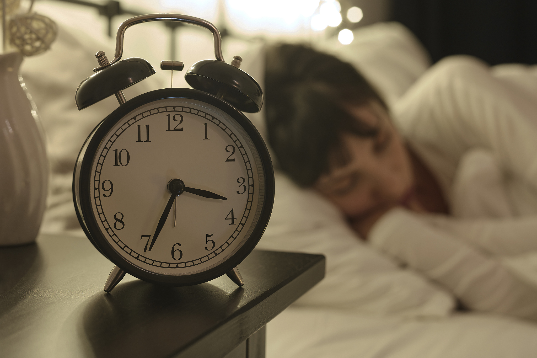 alarm clock on night table