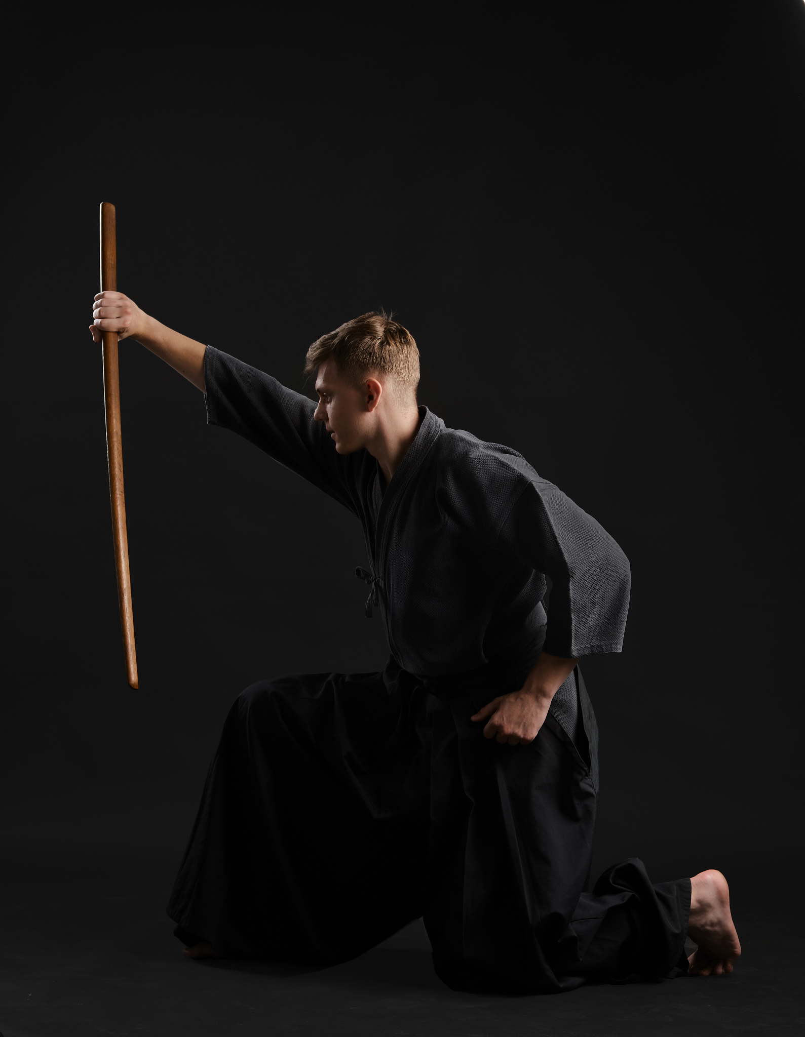 kendo guru wearing in a traditional japanese kimono is practicin