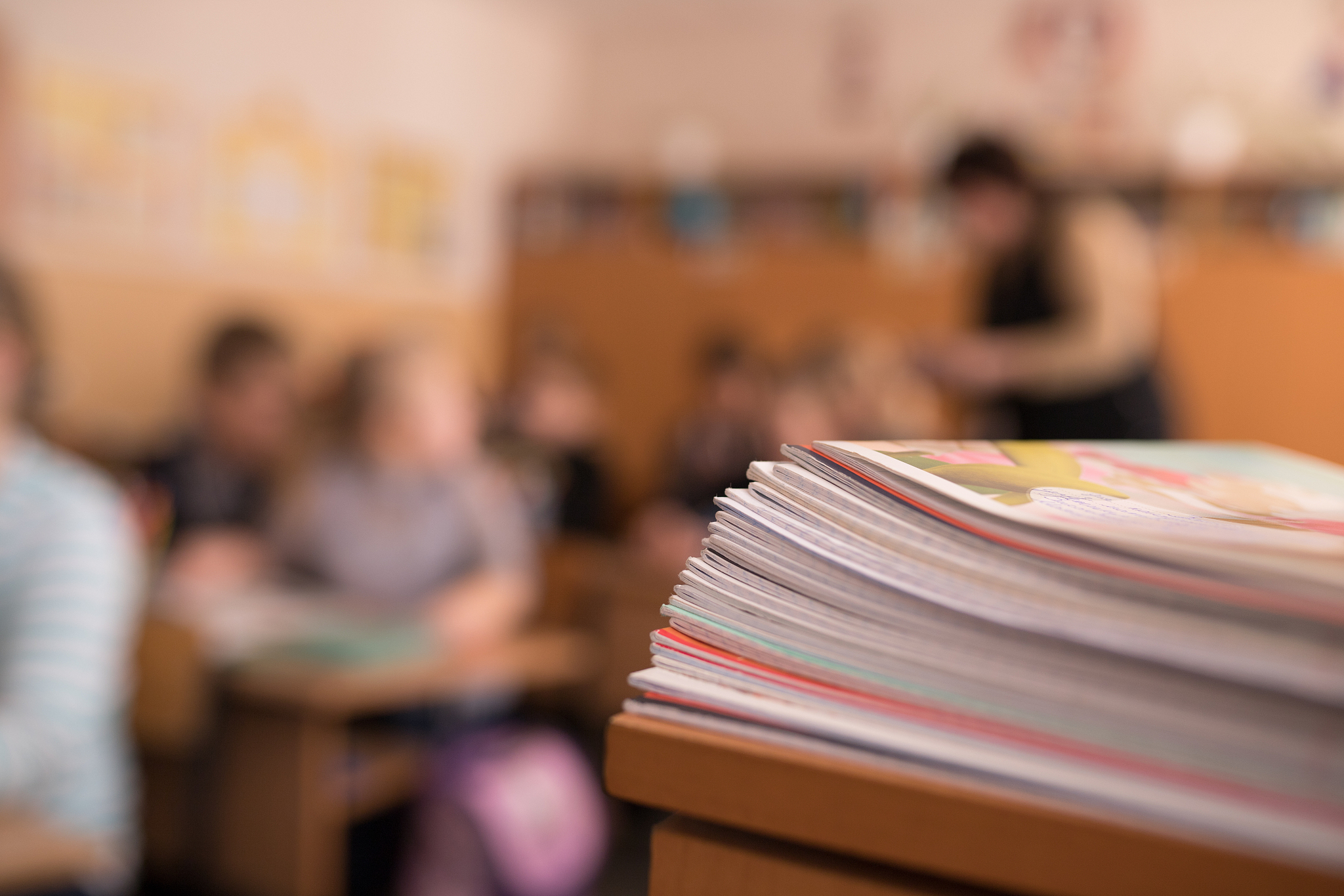 school notebooks on the table in the classroom