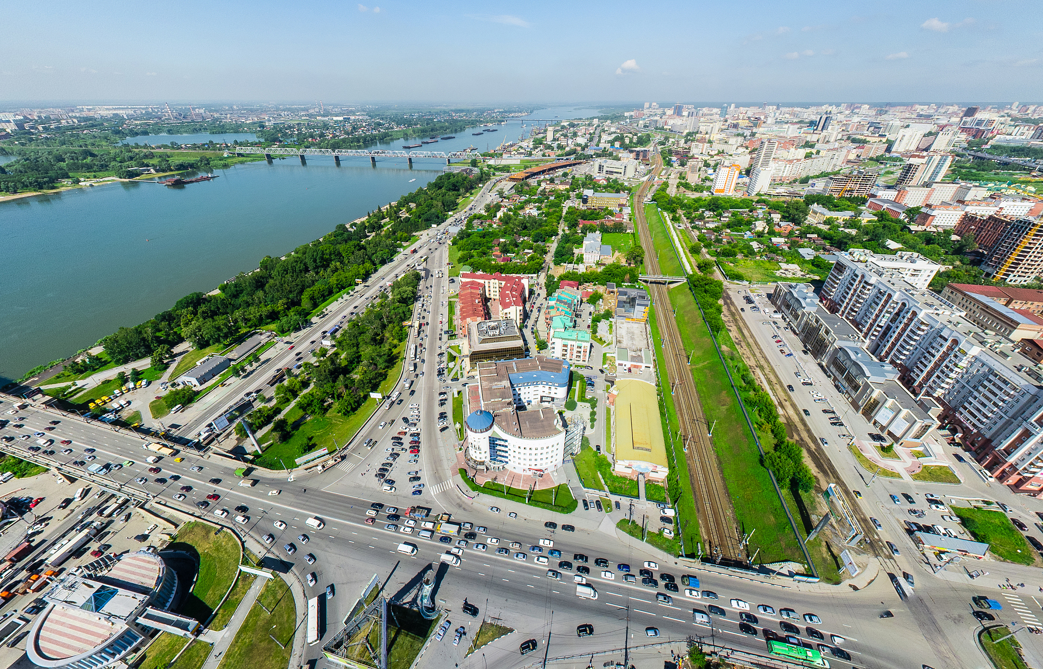 aerial city view with crossroads and roads, houses buildings. co
