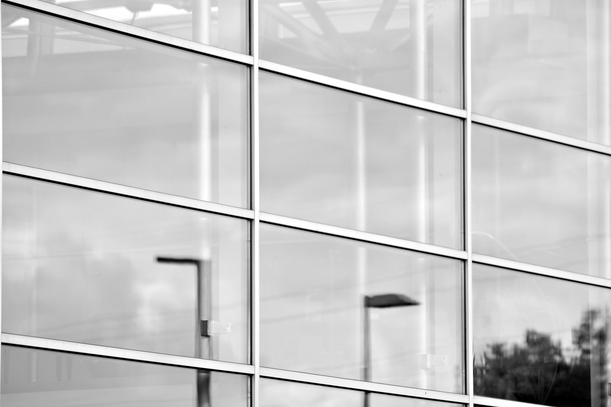 modern office building wall made of steel and glass. black and w