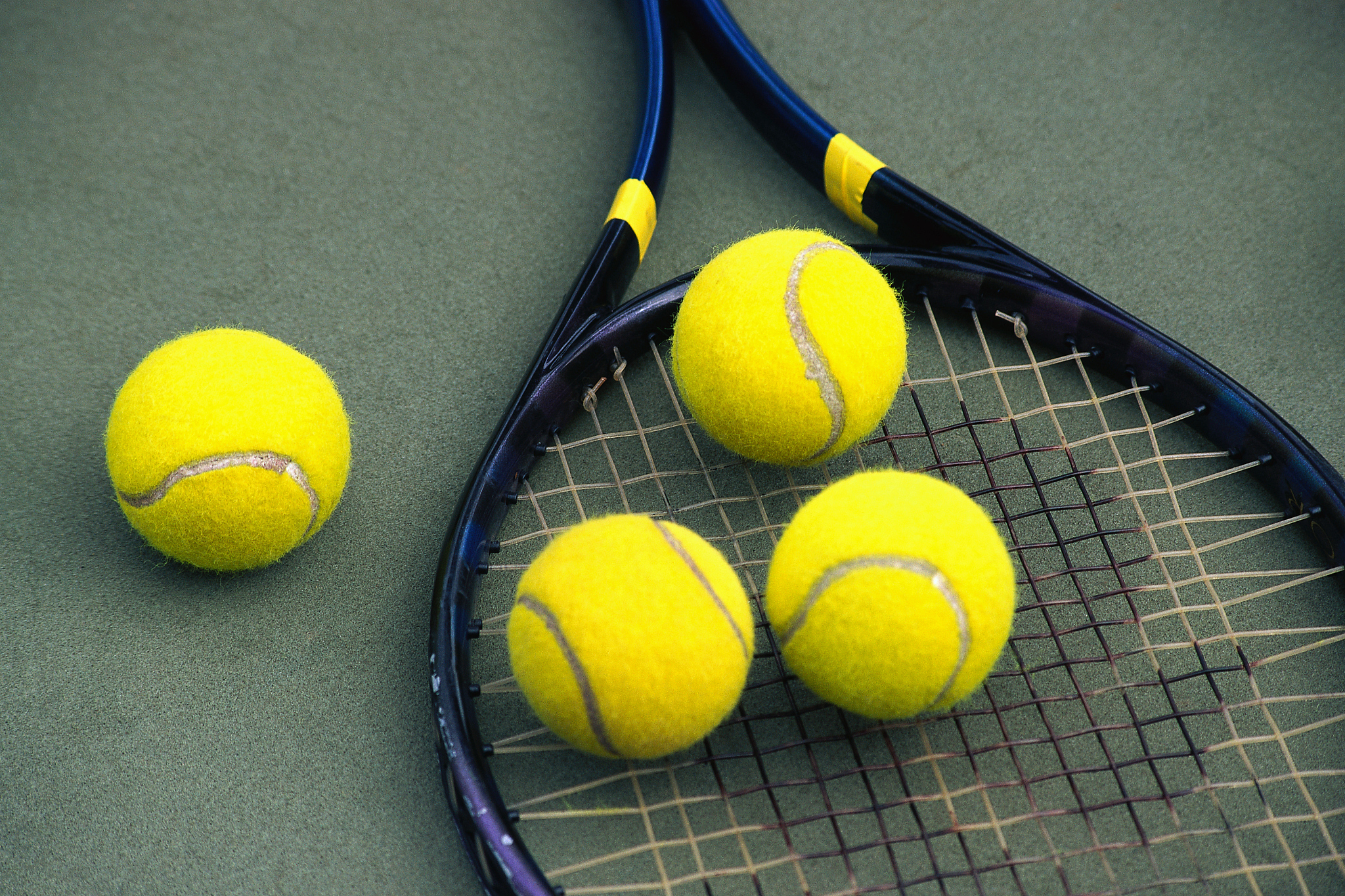 tennis balls and racket