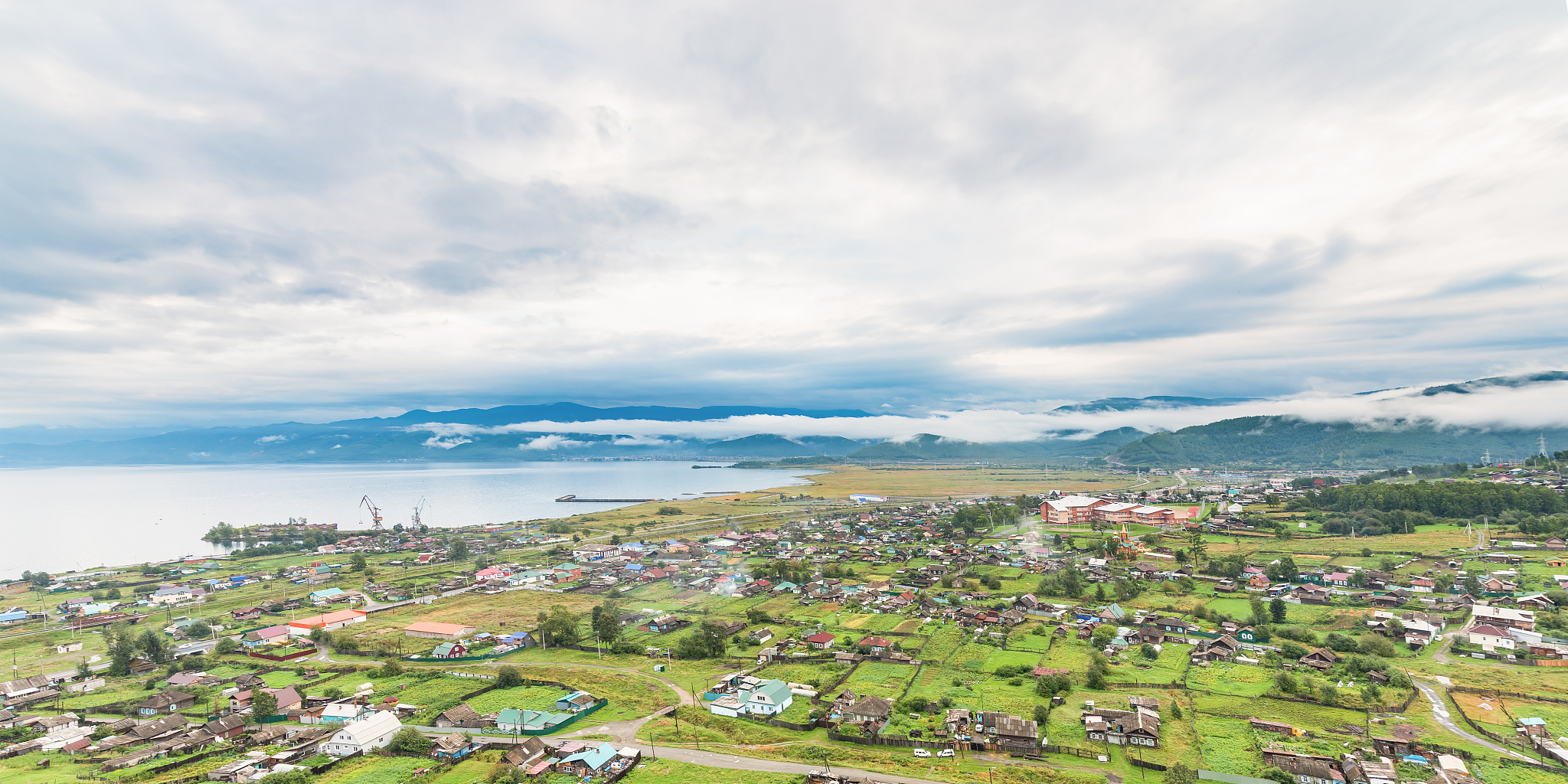 residential quarters, a port on the shore of lake baikal against