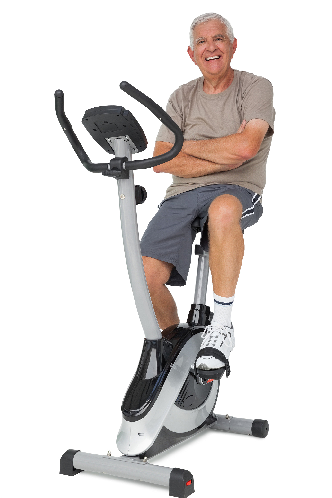 full length portrait of a senior man on stationary bike