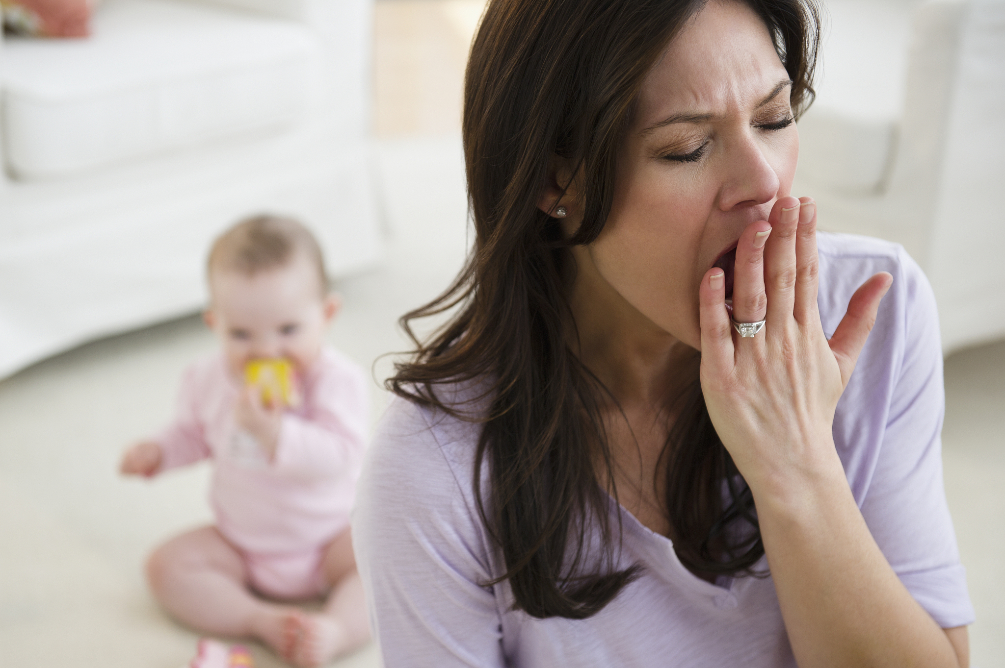 usa, new jersey, jersey city, tired woman yawning, baby daughter