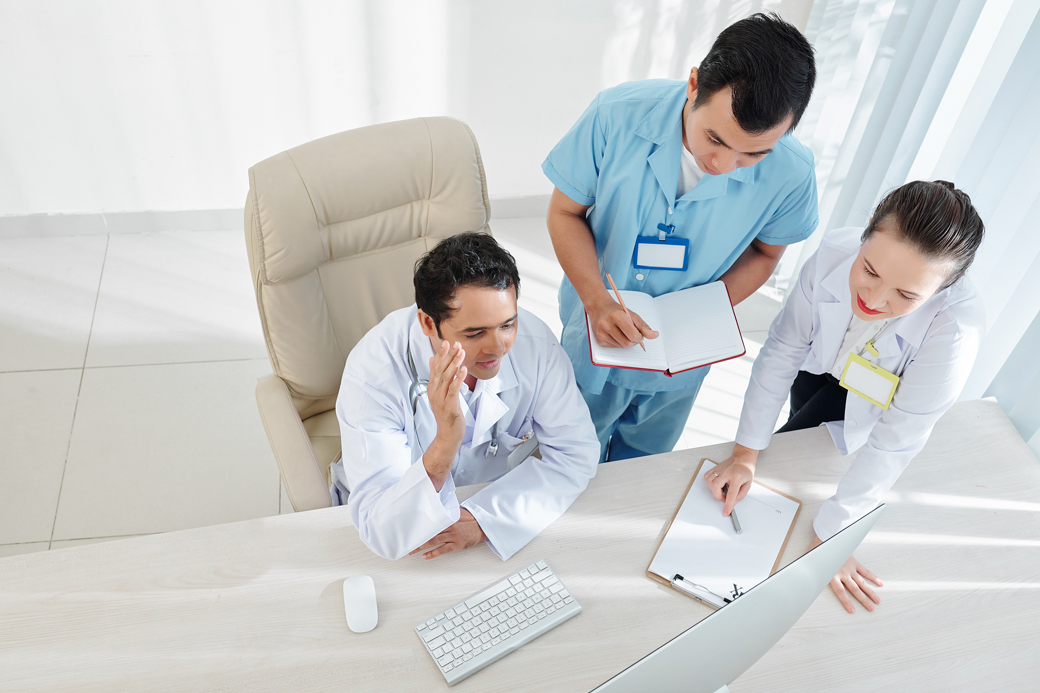 medical specialists watching online webinar