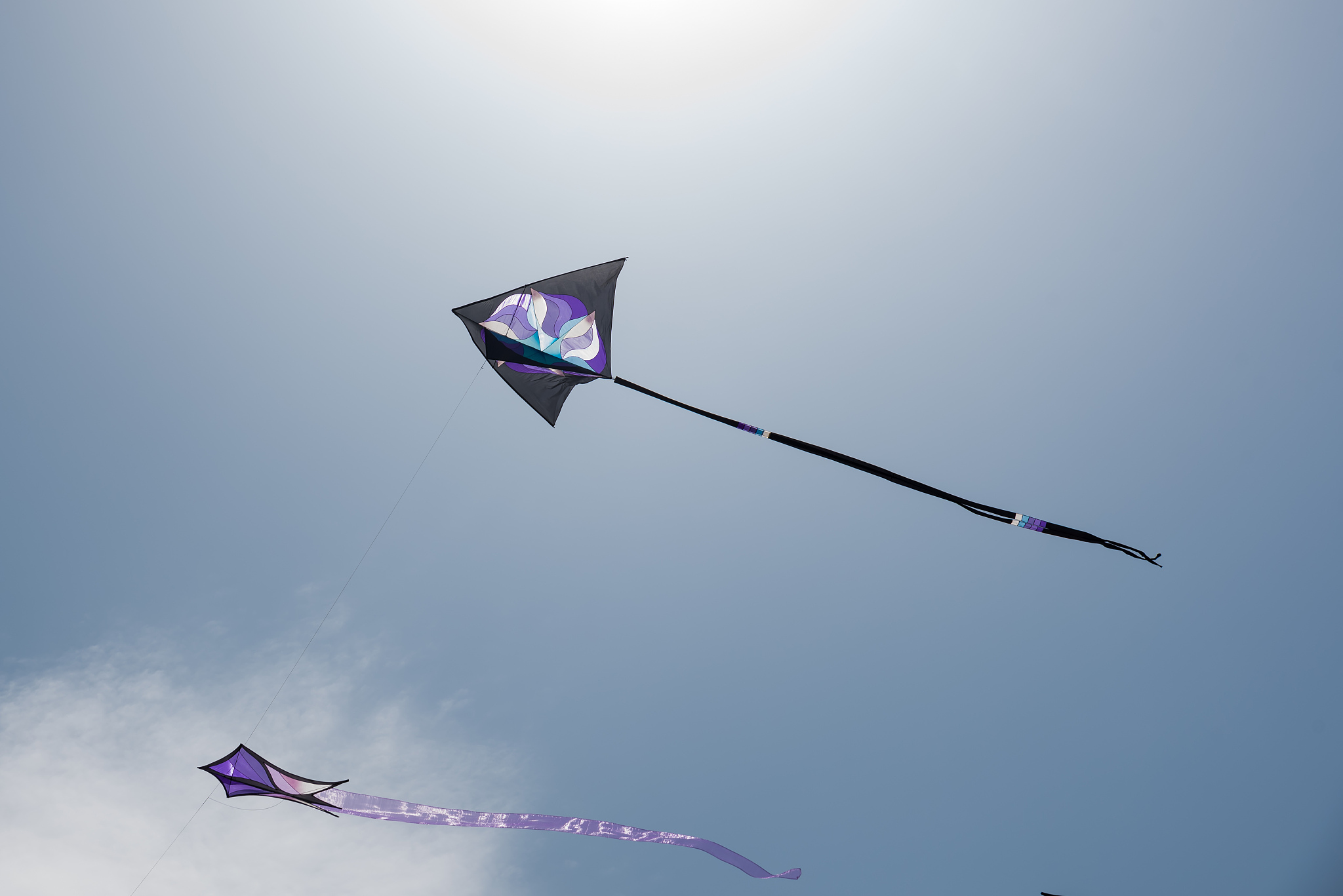 kites with blue sky and white clouds