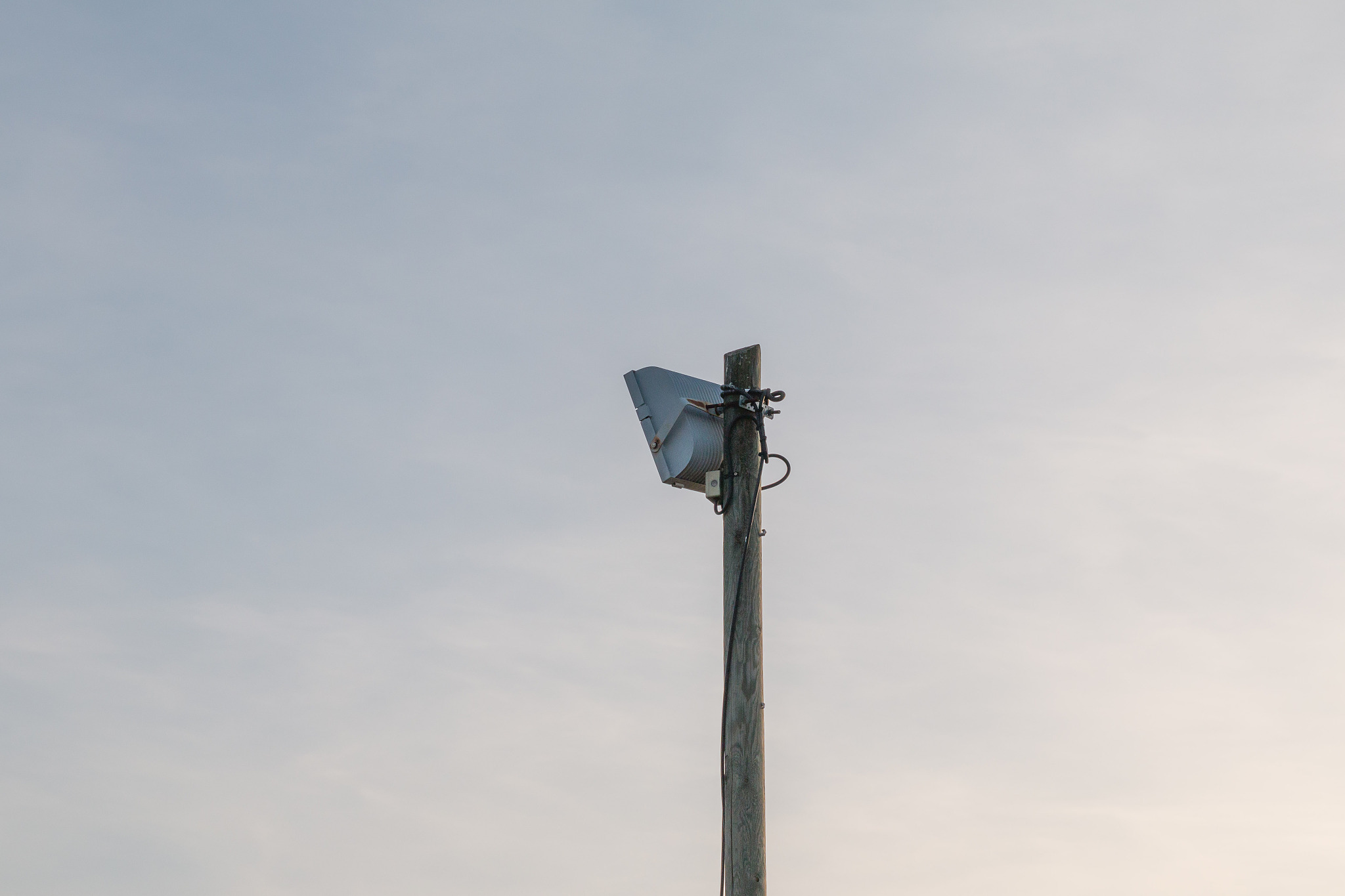 old street lamp on blue sky background