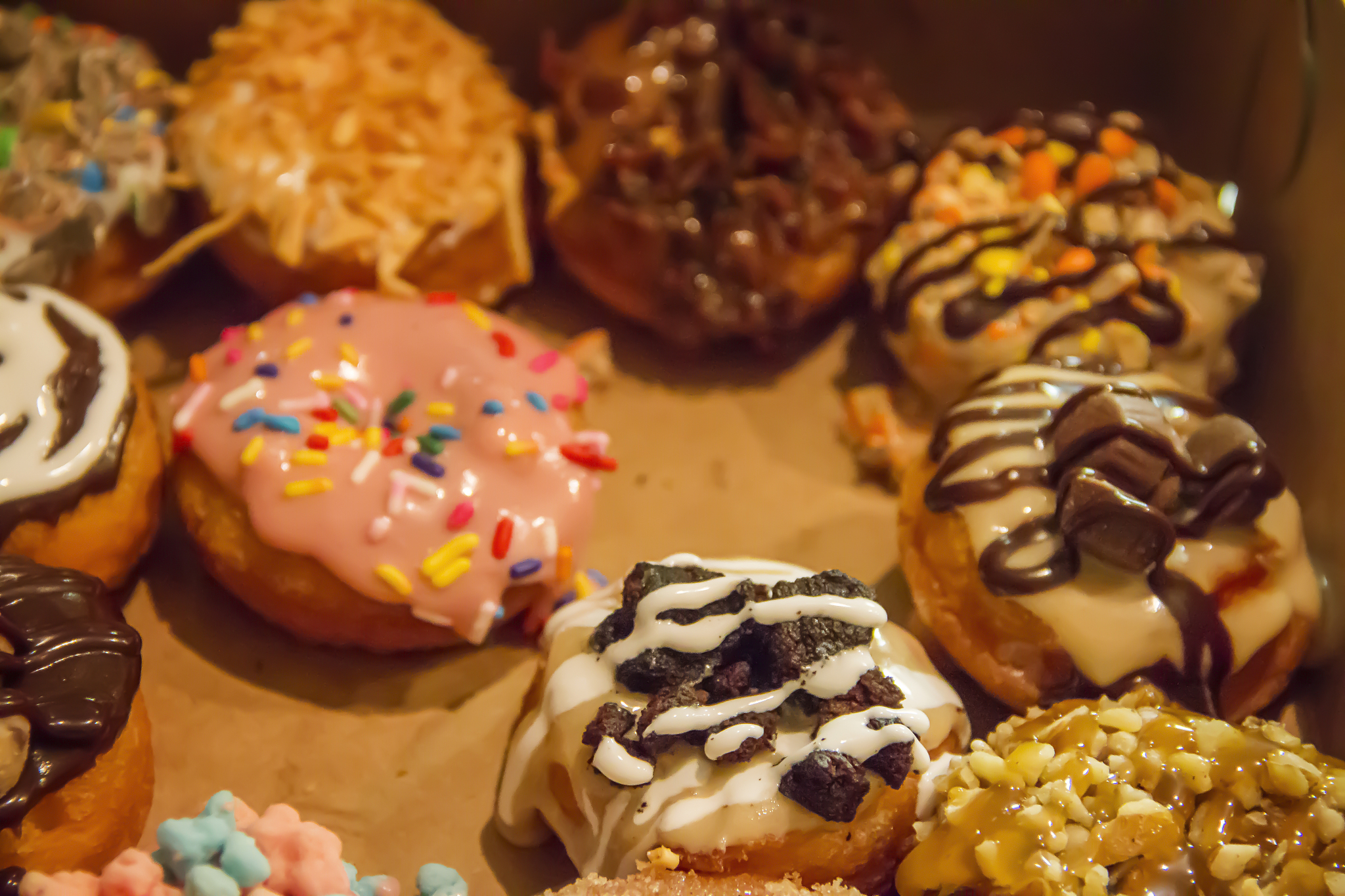 different kinds of donuts in a box