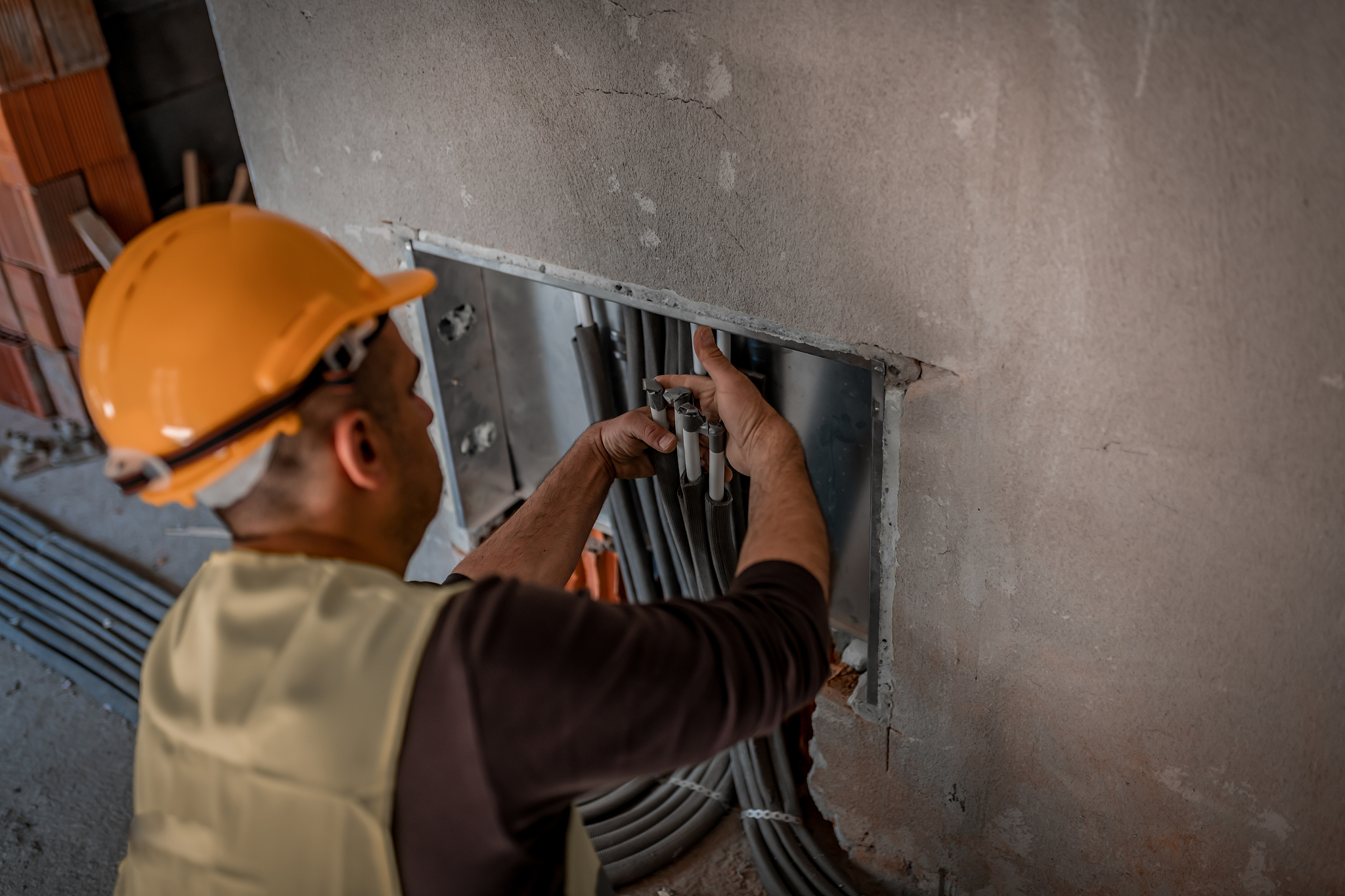 maintenance engineer is working inside the building site