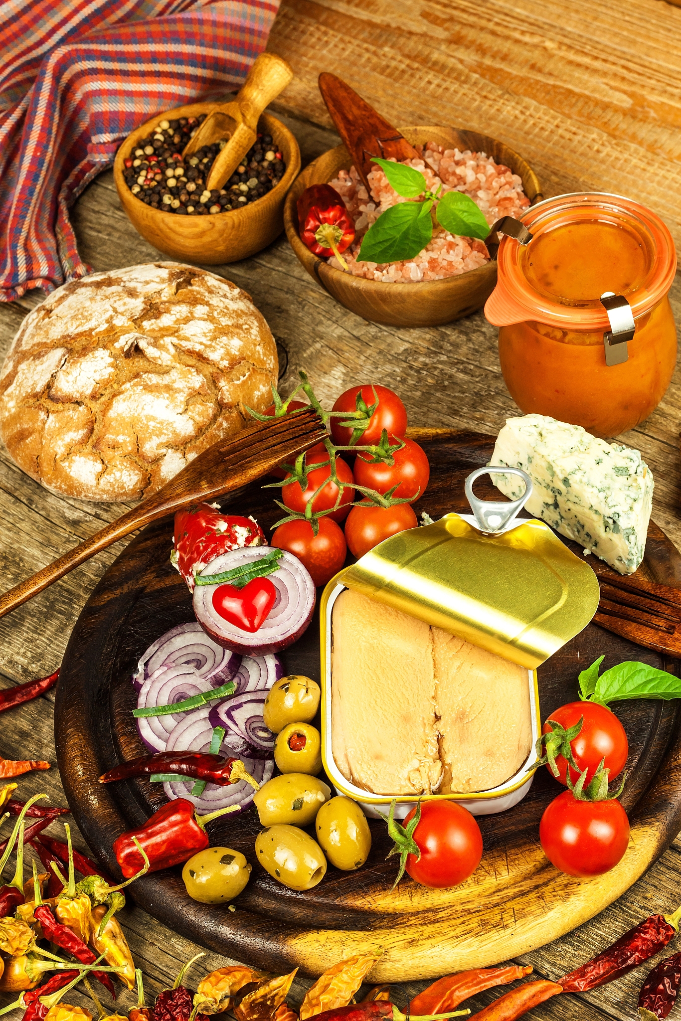 canned tuna on a kitchen table. fish cans and vegetables. food f