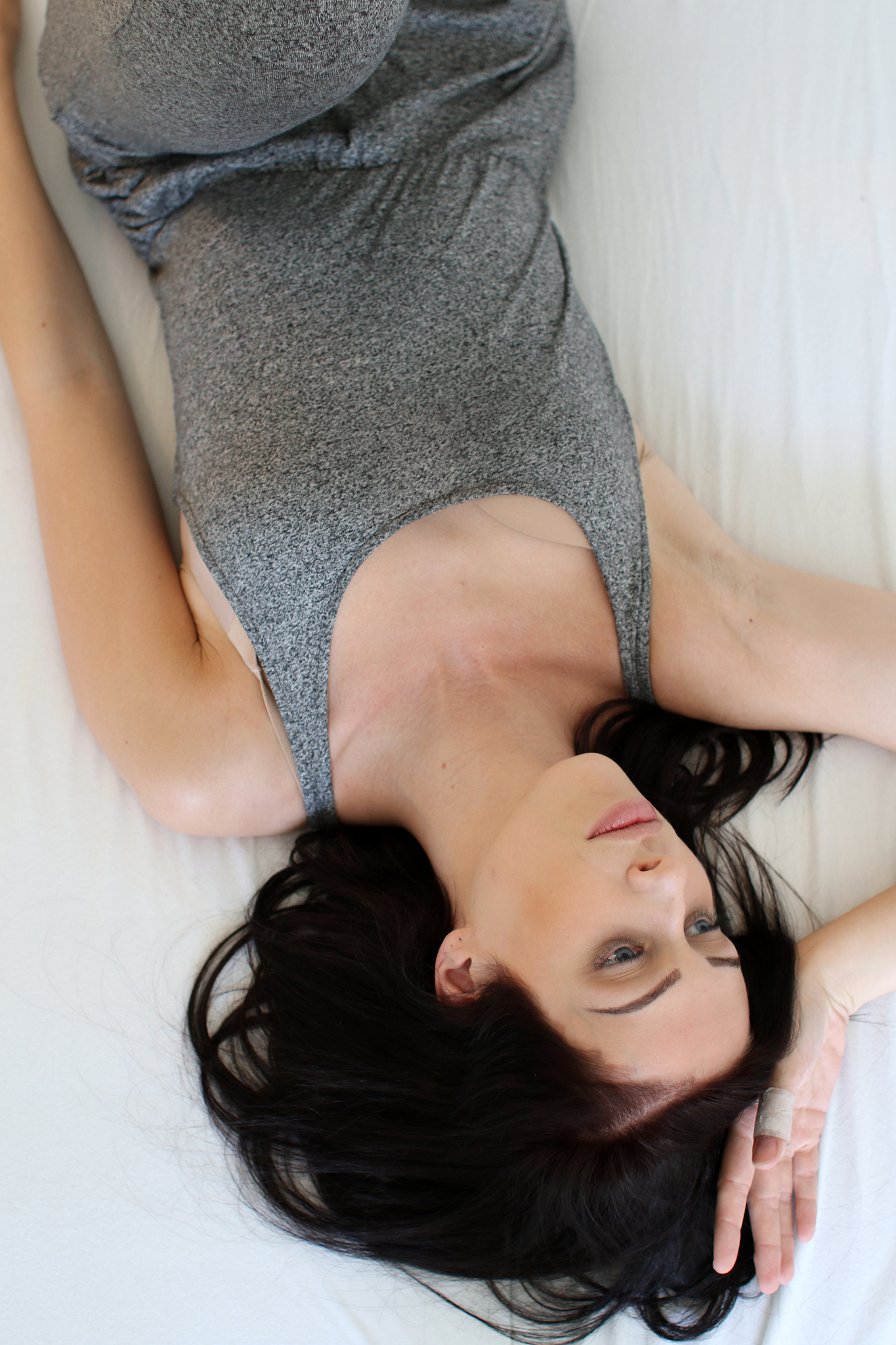 girl posing on bed