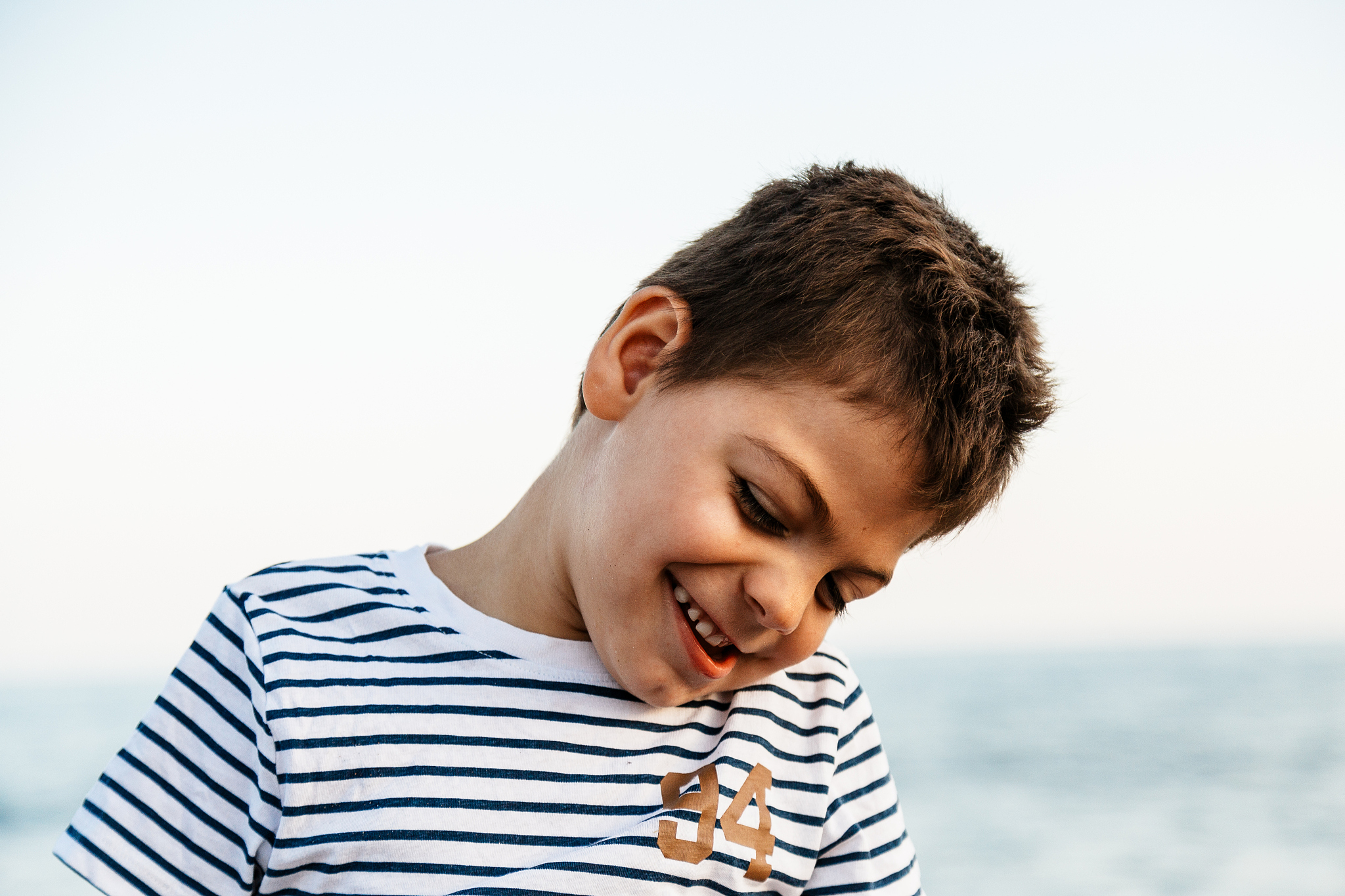 boy playing on the beach
