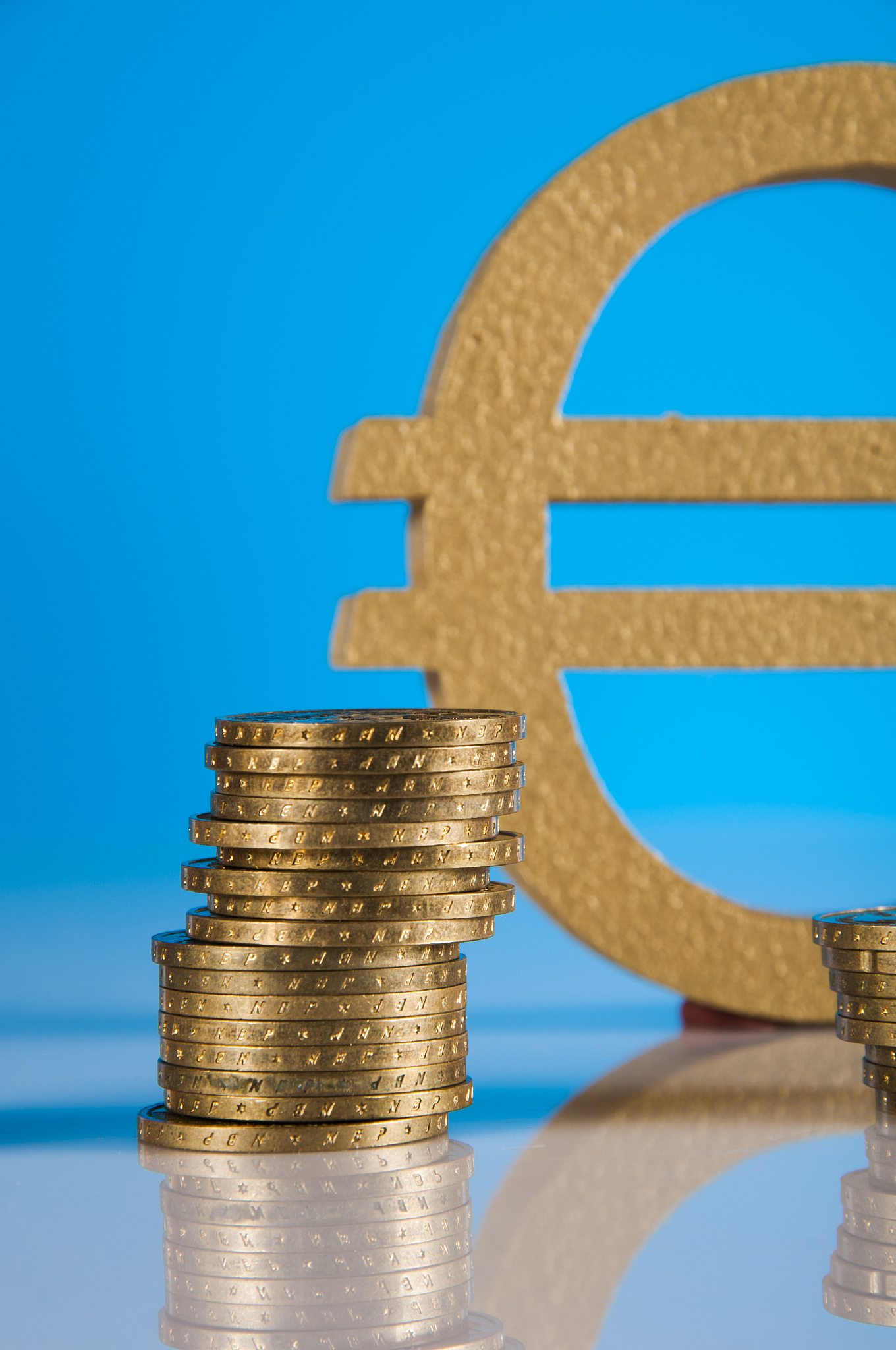 business theme, gold coins with light background