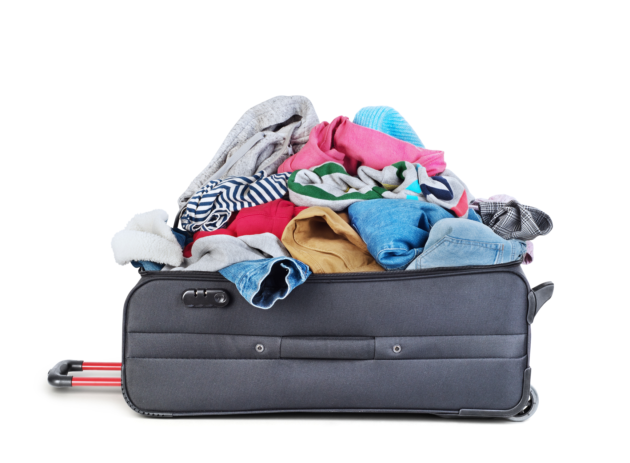 open suitcase with clothing isolated on a white
