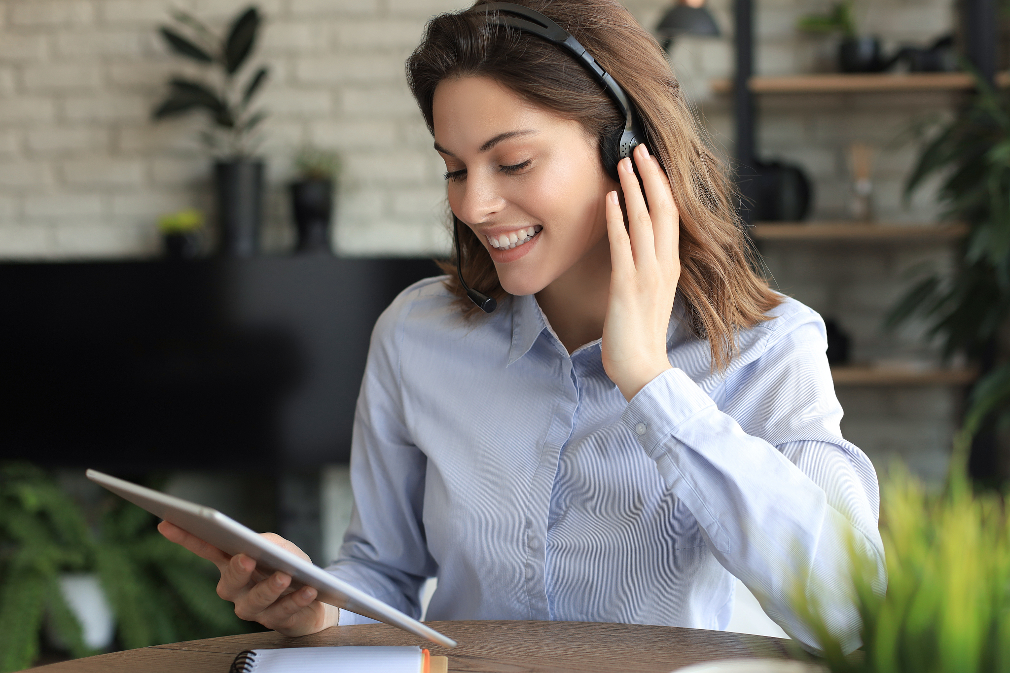 freelance business women using tablet working call video confere