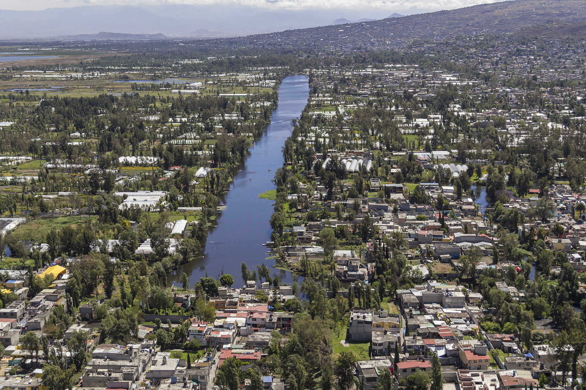 aerial view of apatlaco channel in the district of xochimilco in