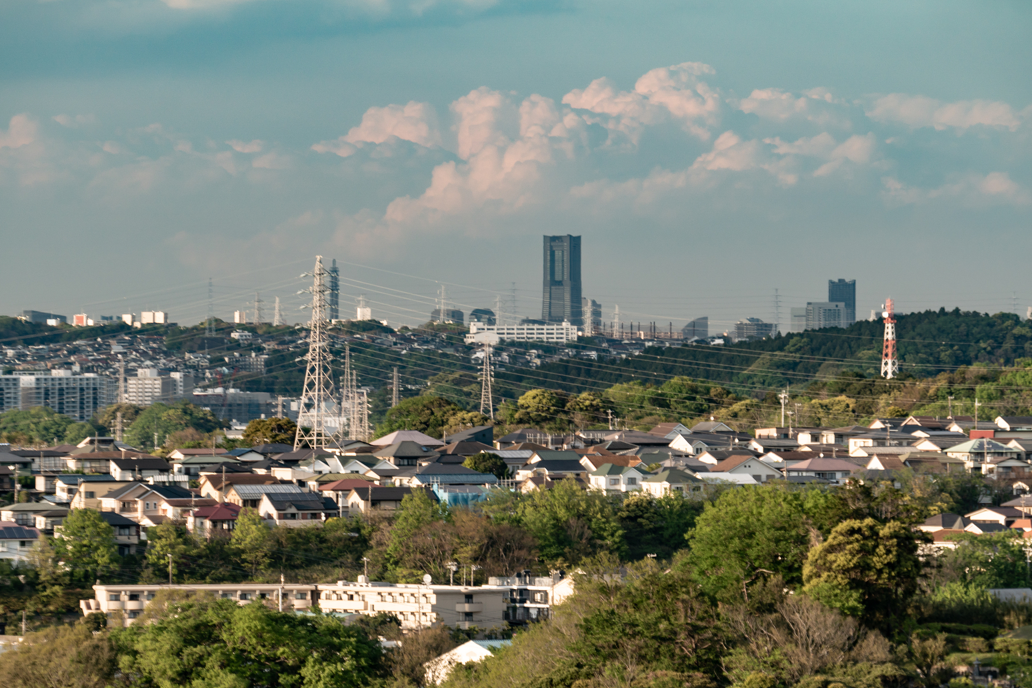 cumulus clouds on the residential district and city buildings in
