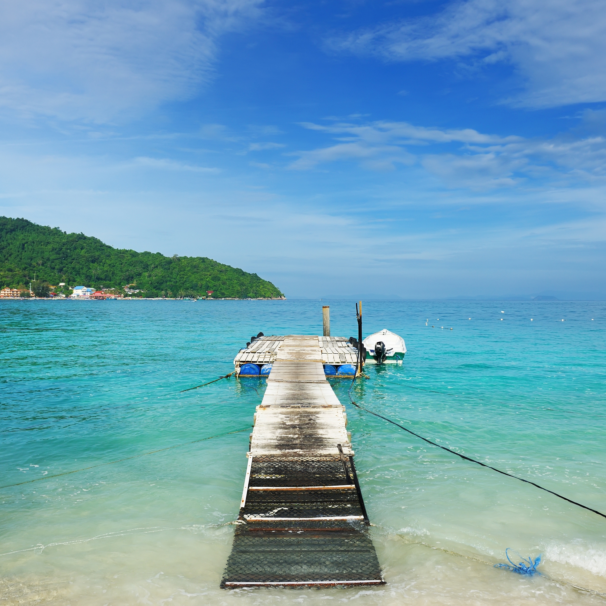 beautiful beach jetty at perhentian islands, malaysia