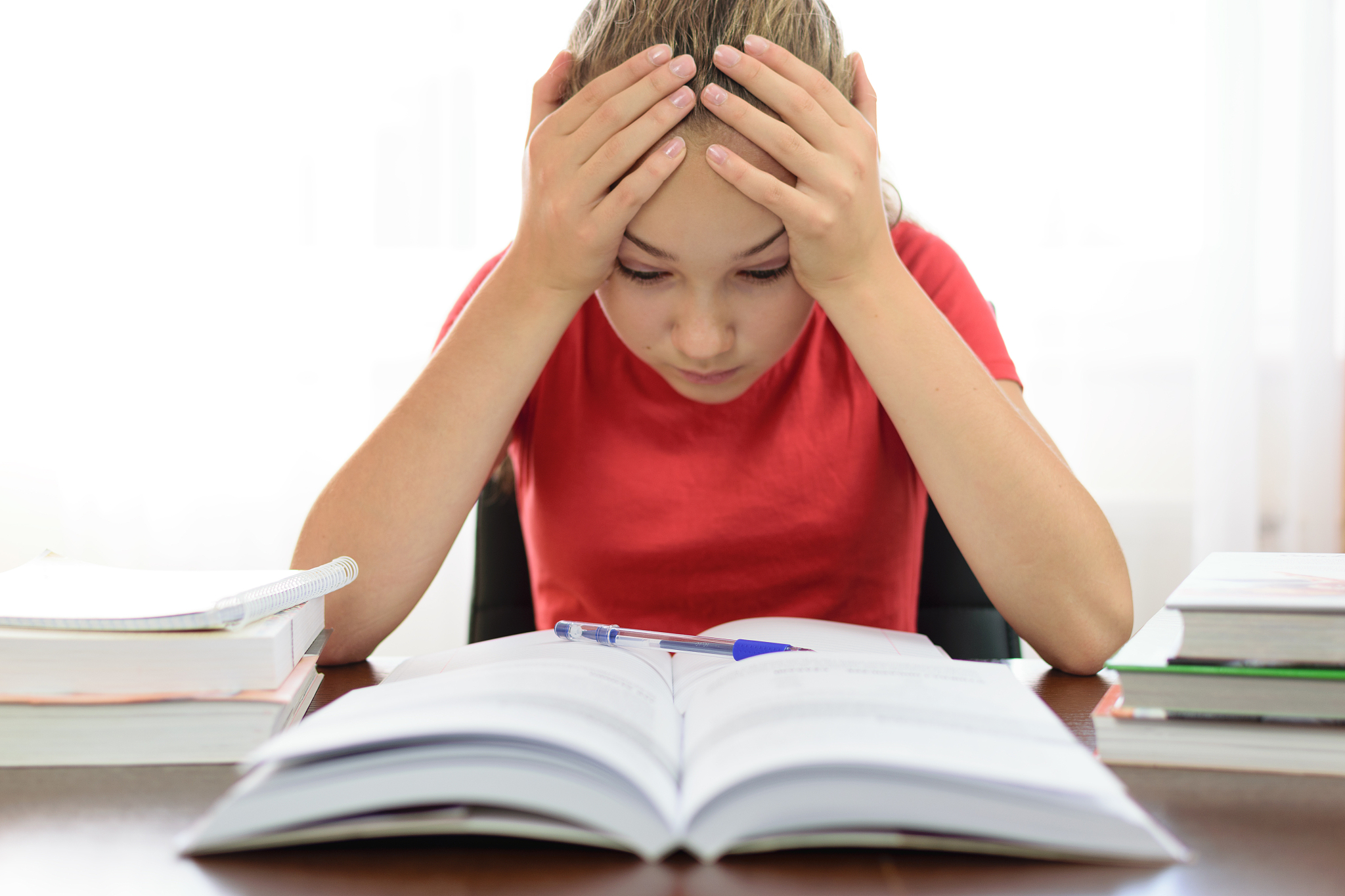 student is frustrated and tired of his homework