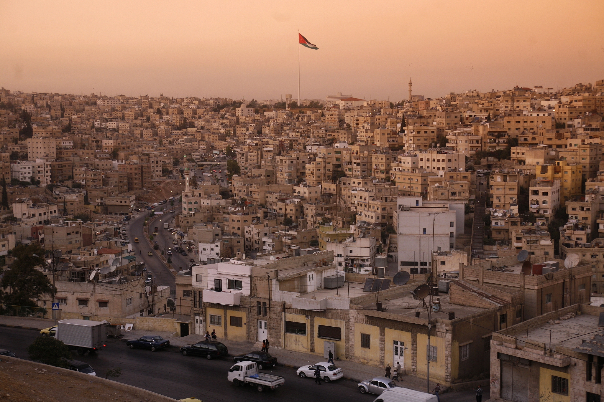 aerial view of houses in town during sunset