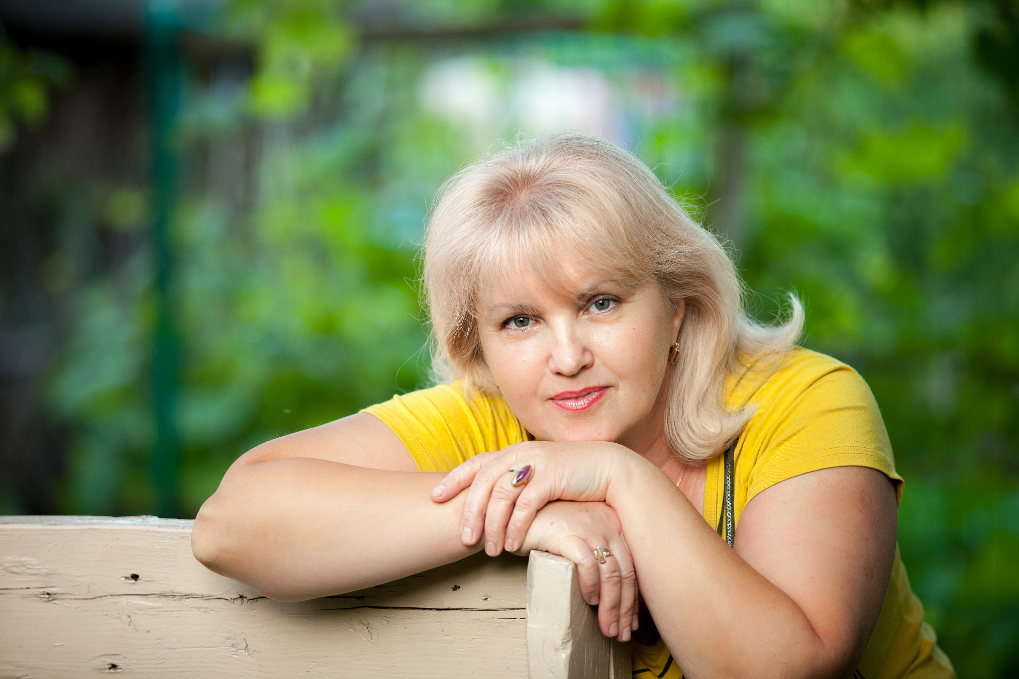 grown woman on a green background