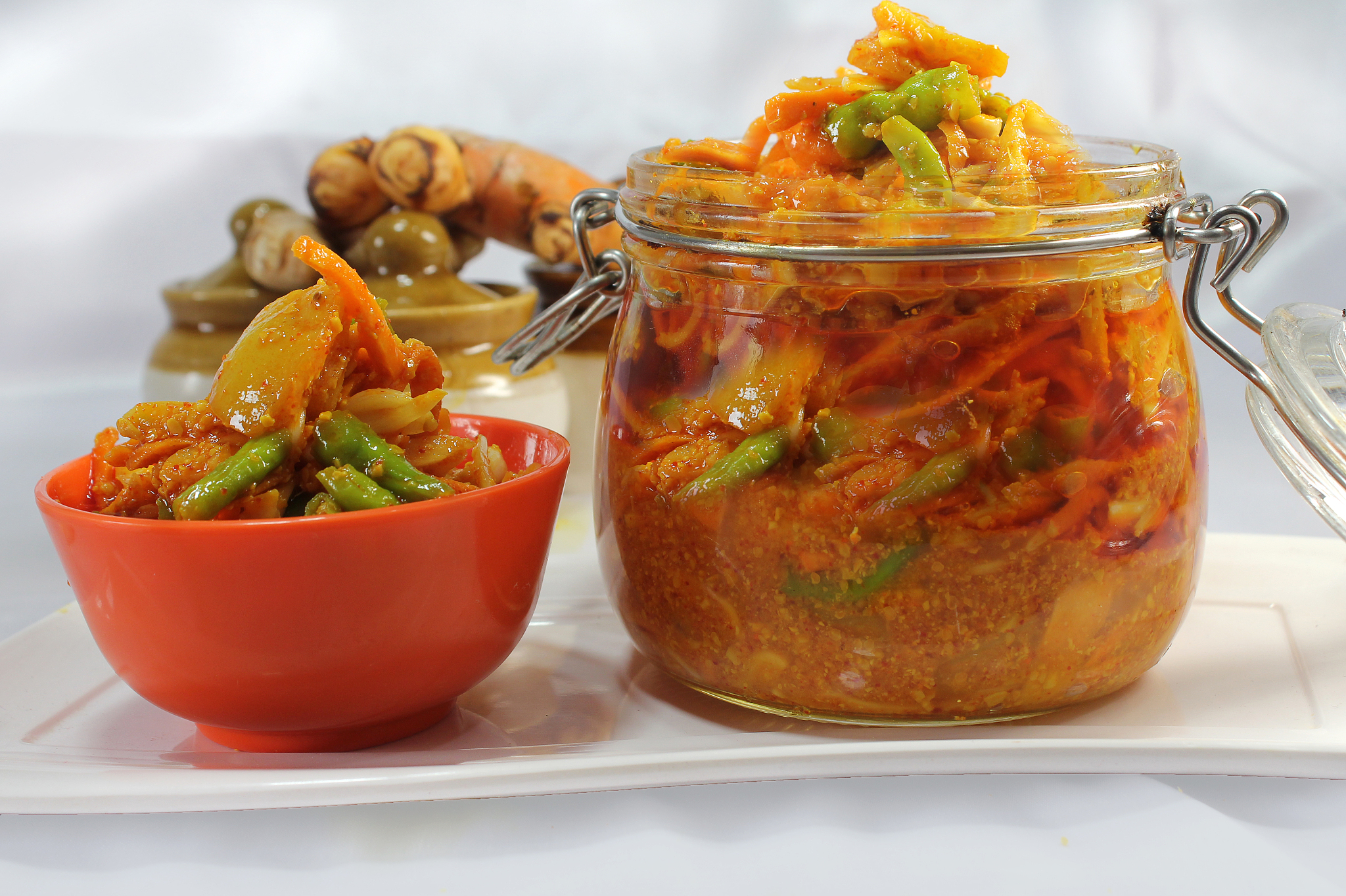 indian spicy mixed pickle prepared at home and served in glass j