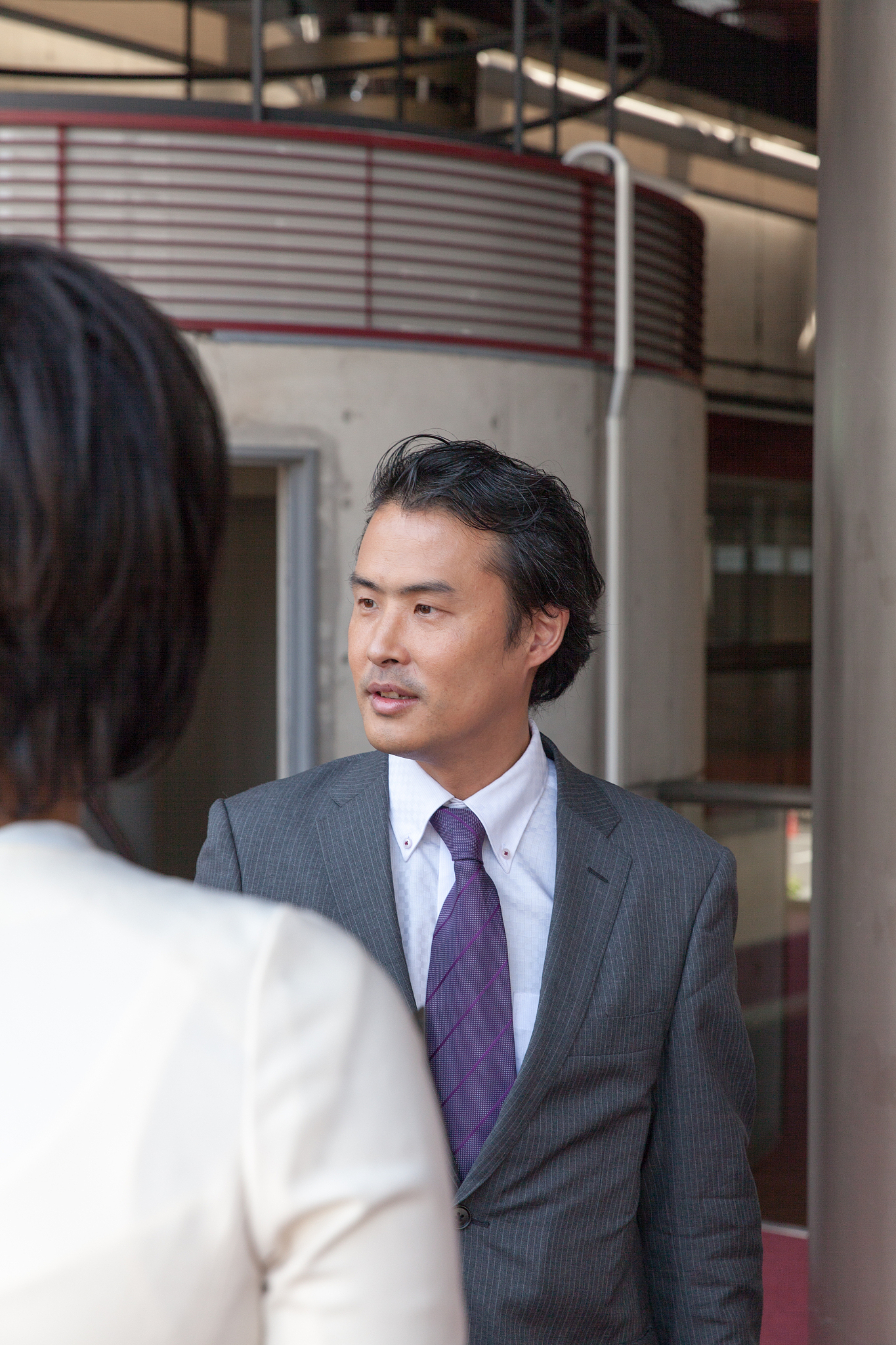 the businessman taaliking  in the lobby at office
