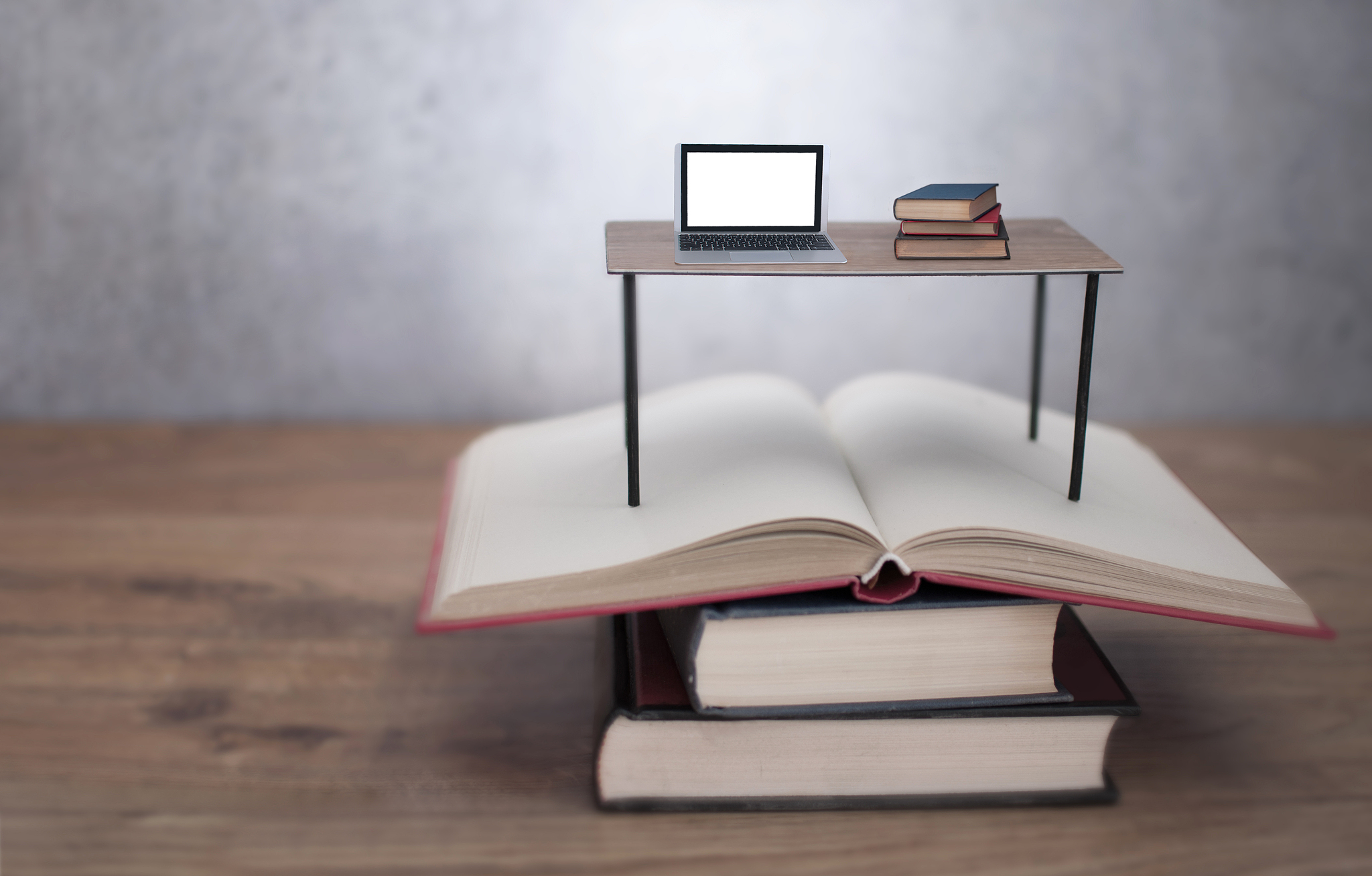 study time, open books with laptop and desk