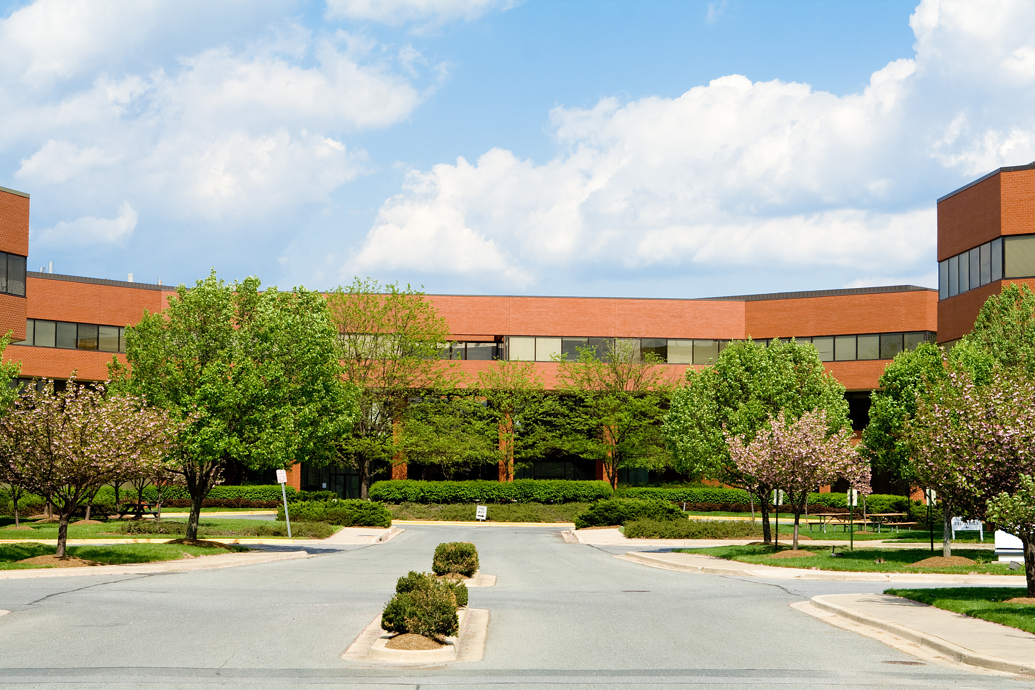 new brick office building, trees, suburban maryland, usa, blue s