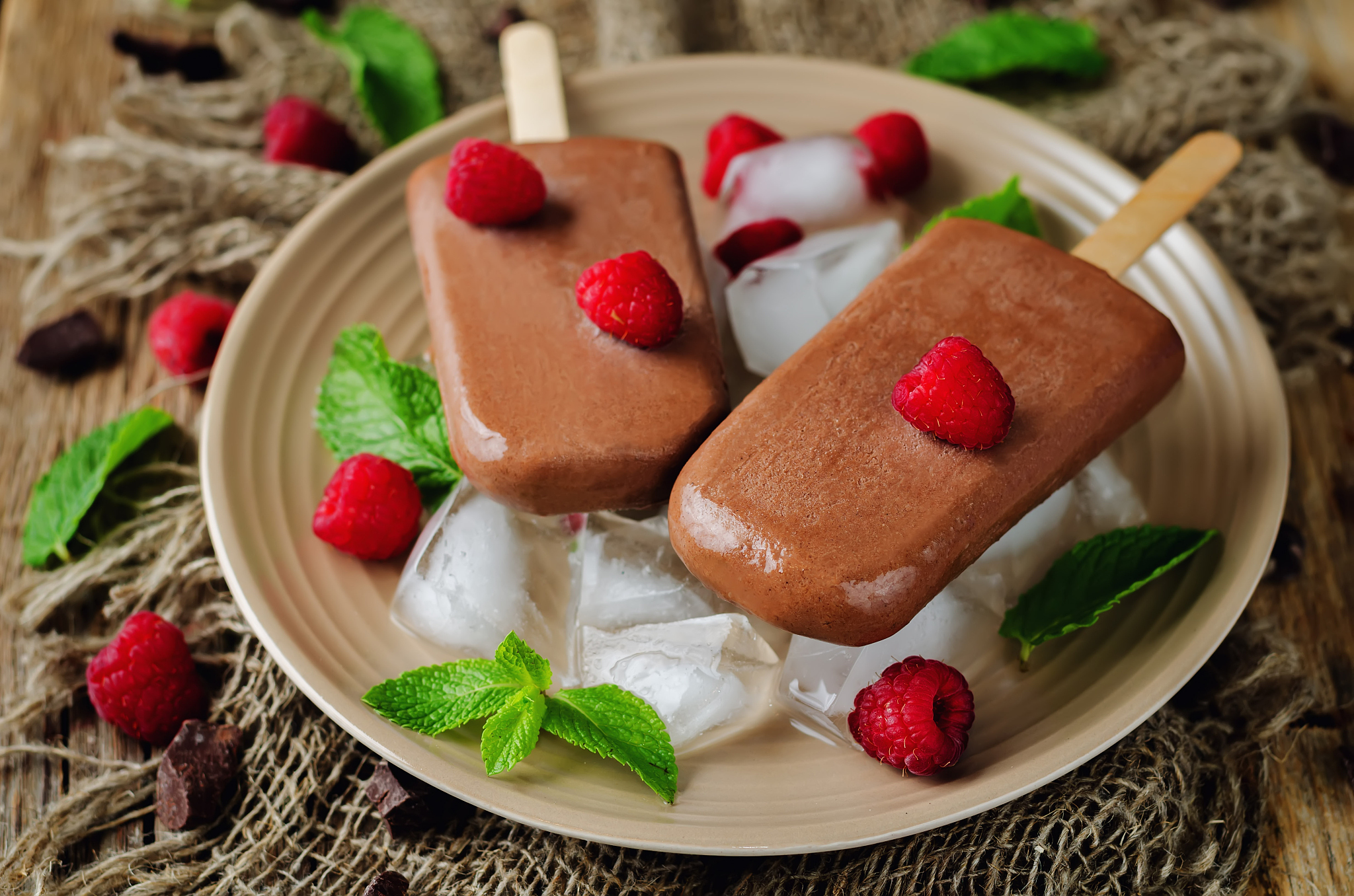 chocolate banana ice cream with raspberries, mint and ices