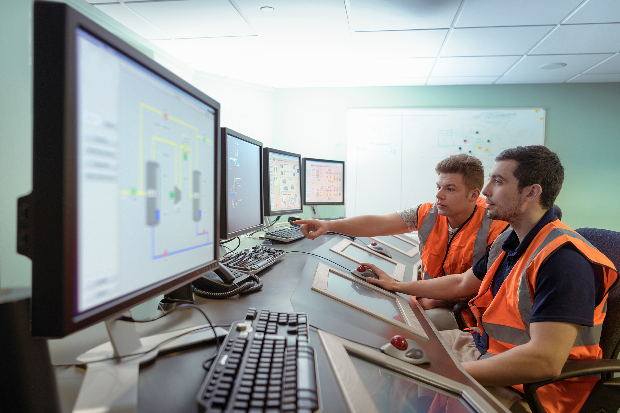 apprentice engineers in industrial production facility training