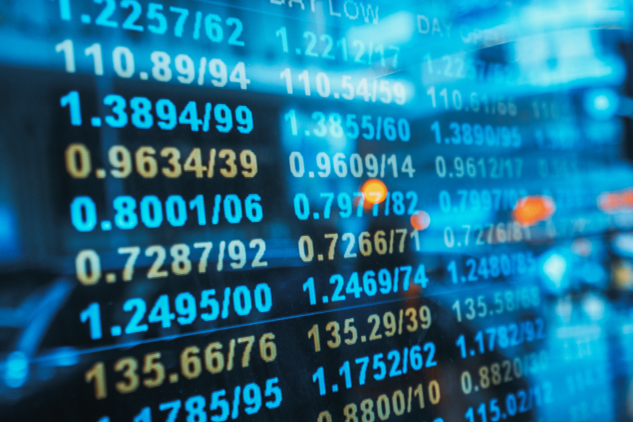 financial stock market numbers and city light reflection