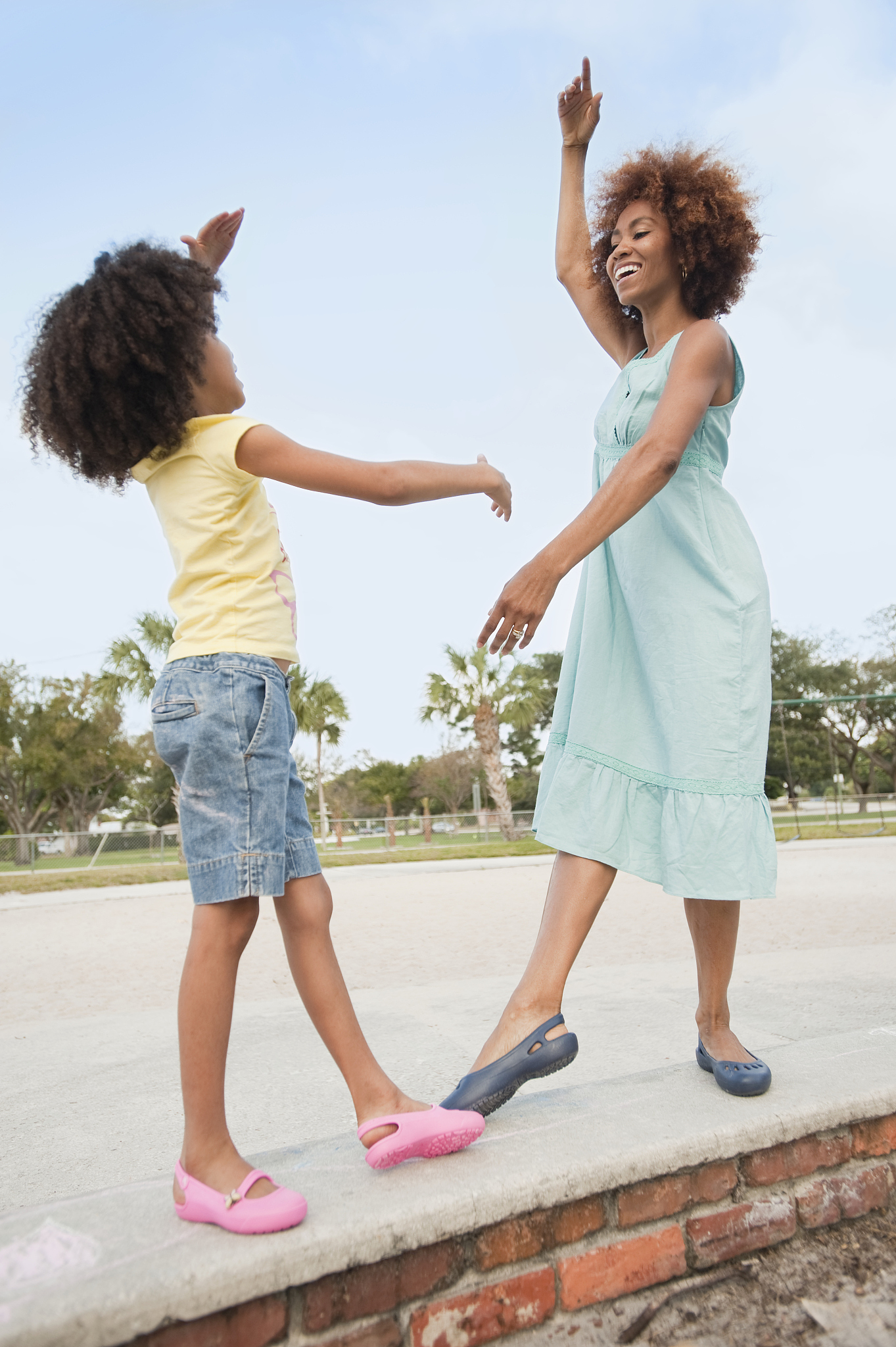 mother ballet dancing with daughter