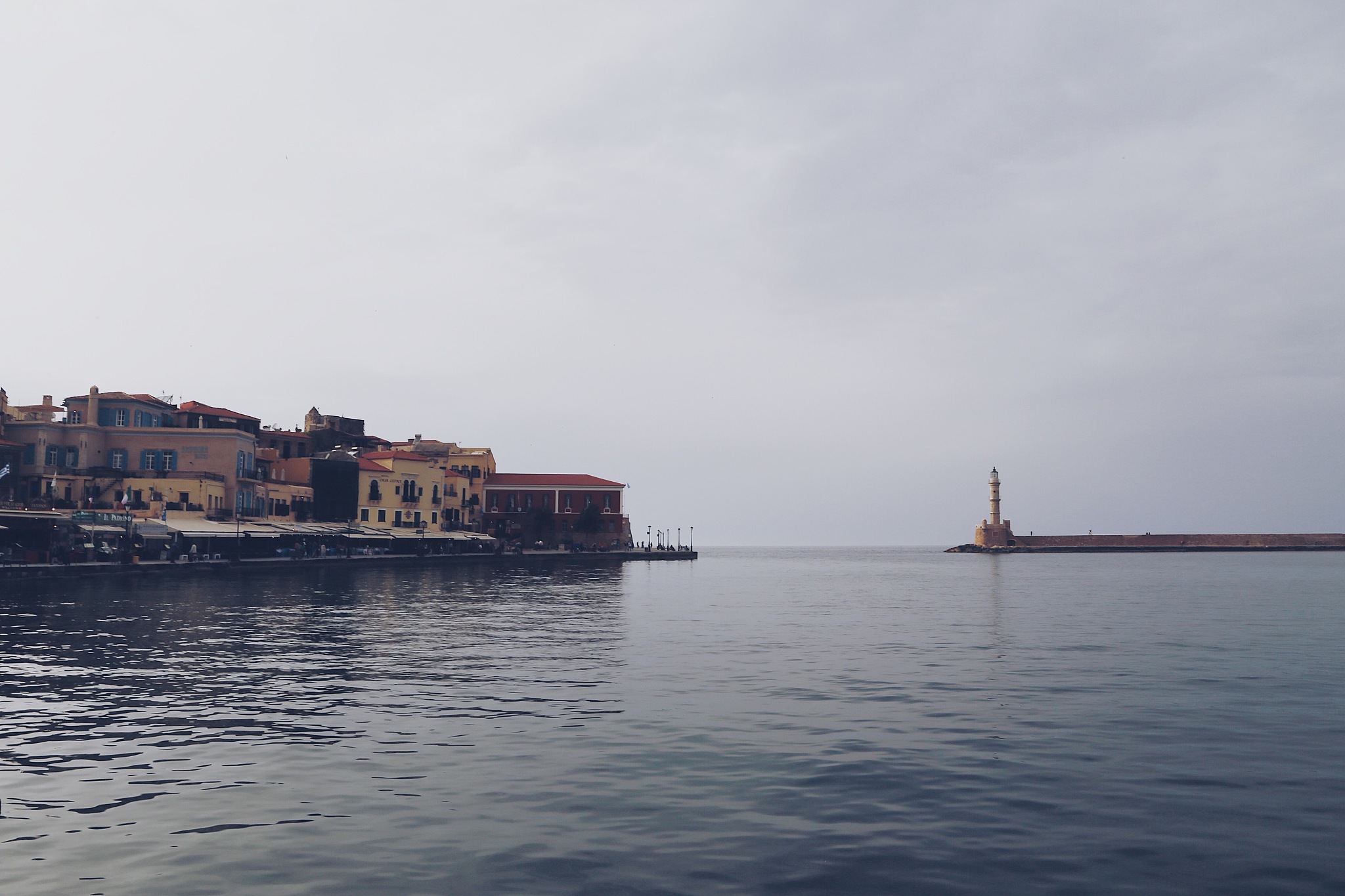 scenic view of sea and buildings against sky