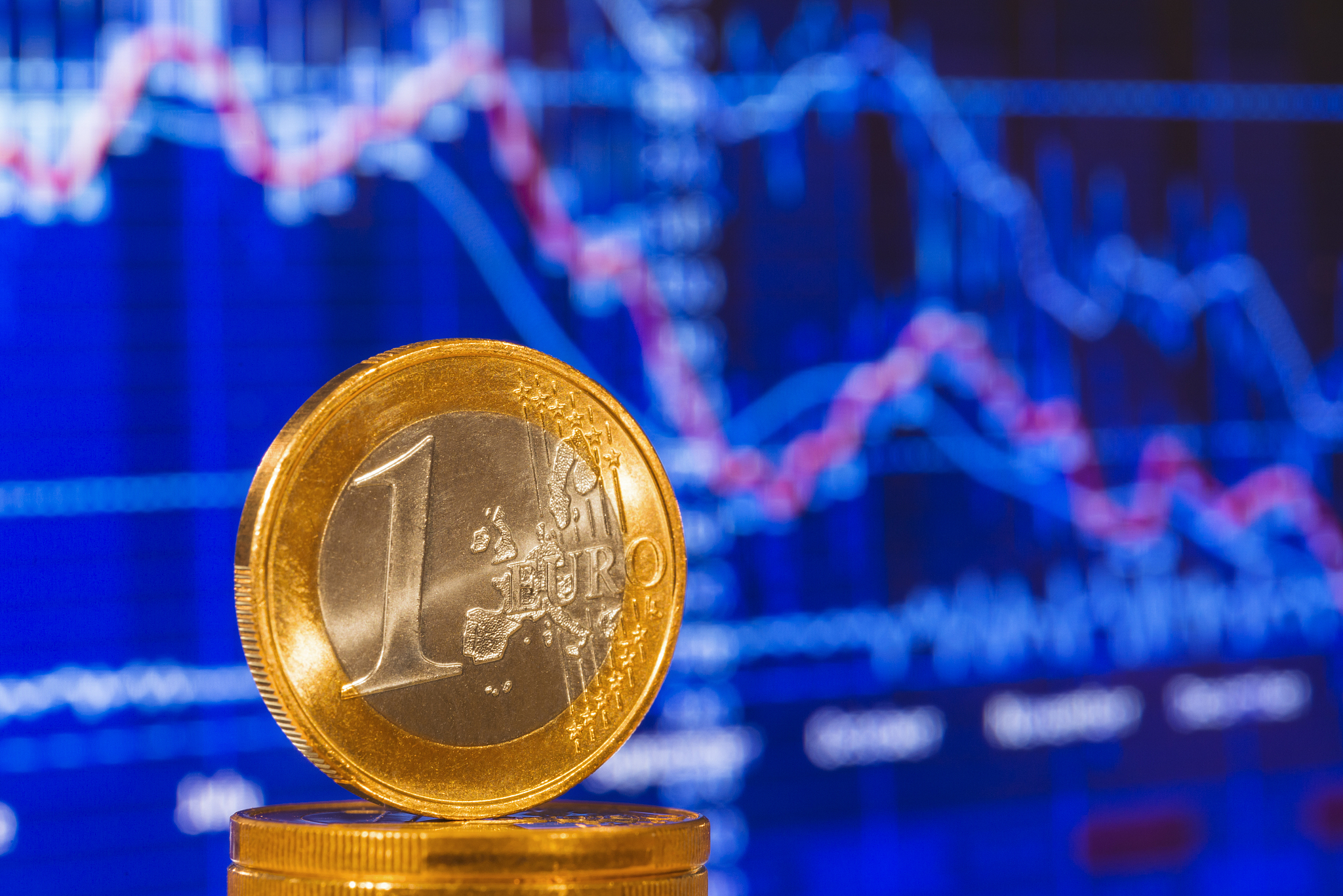 euro coin and chart