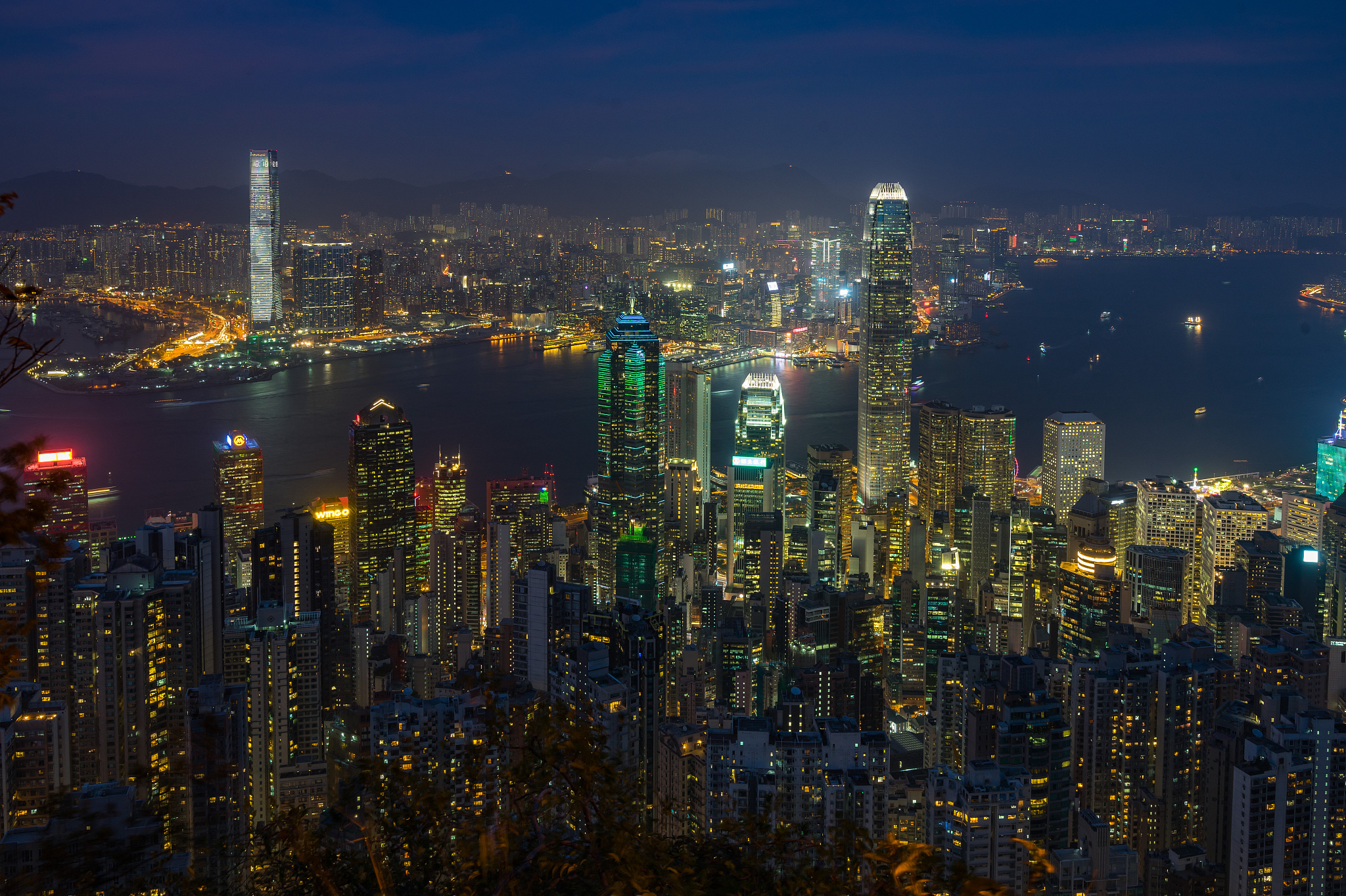 hong kong and victoria harbour cityscape at night