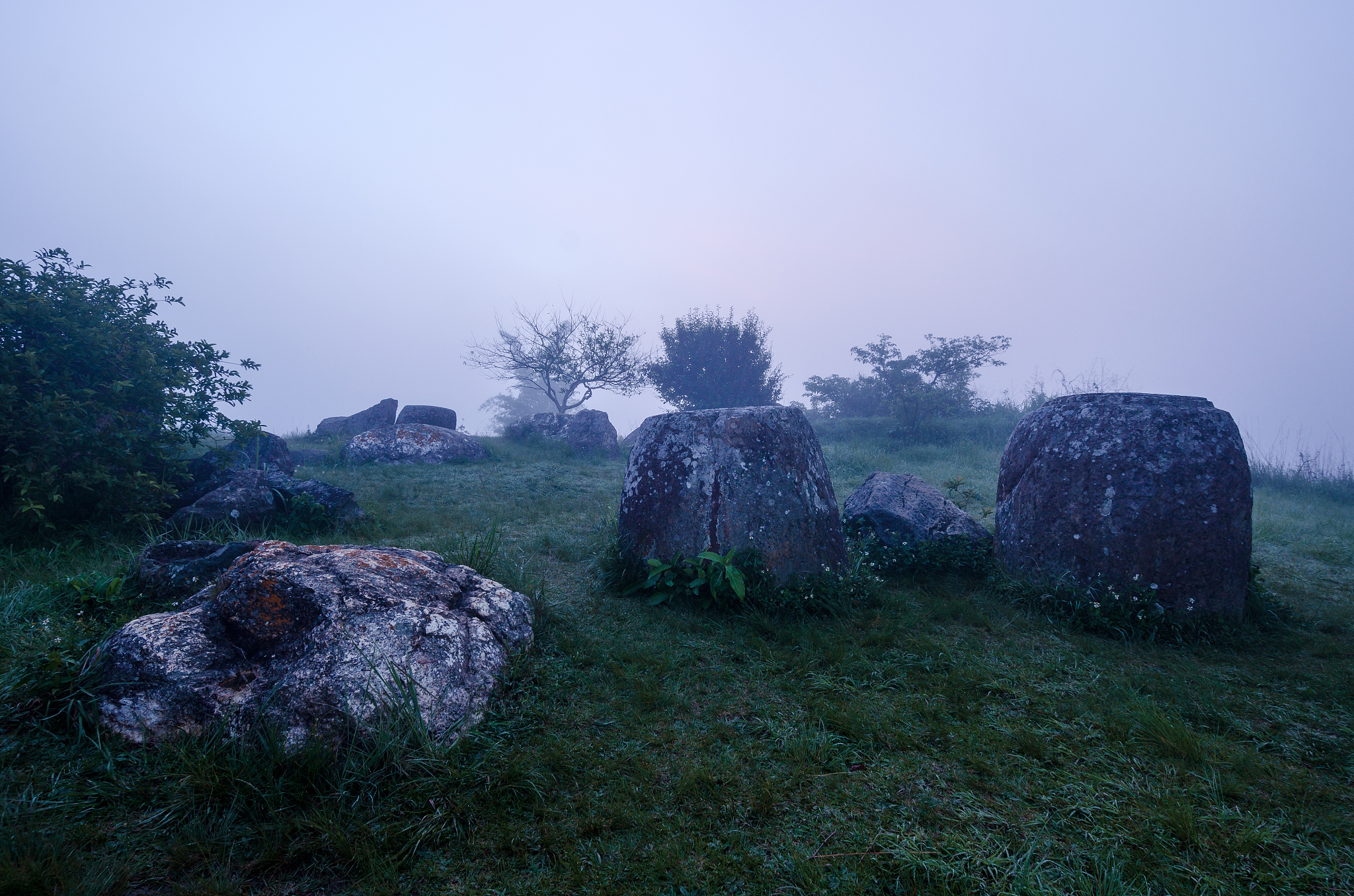 a field of jars in phonsavann, laos
