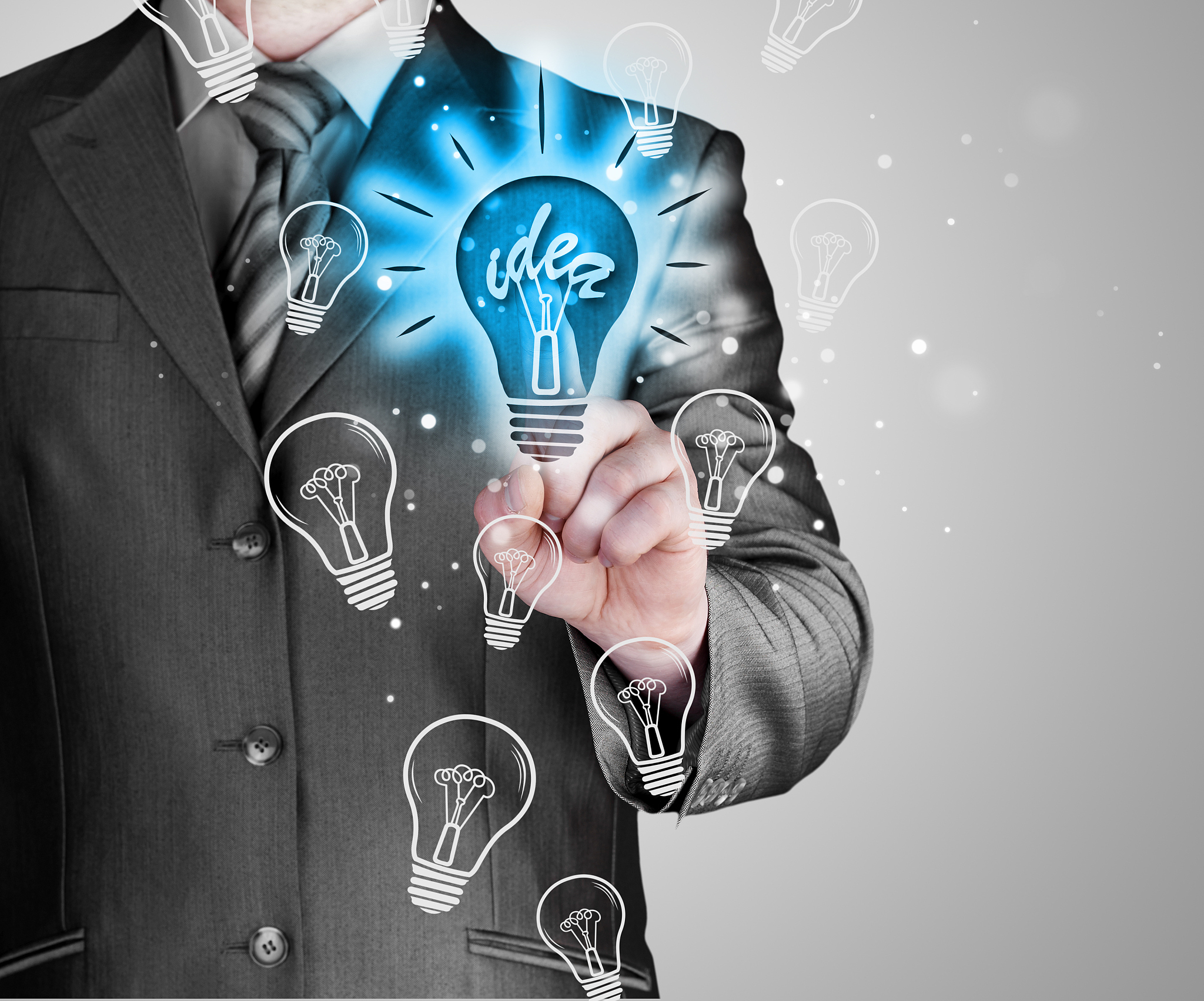 business man touching light of idea