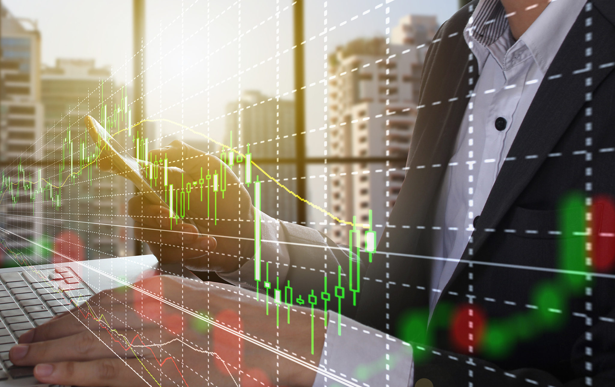 double exposure of businessman working and financial data
