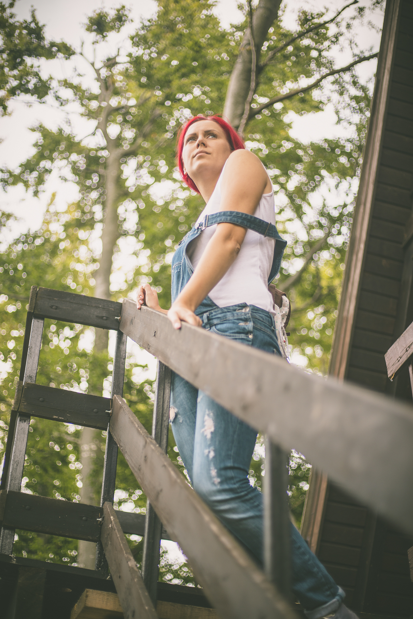 woman is standing on the steps