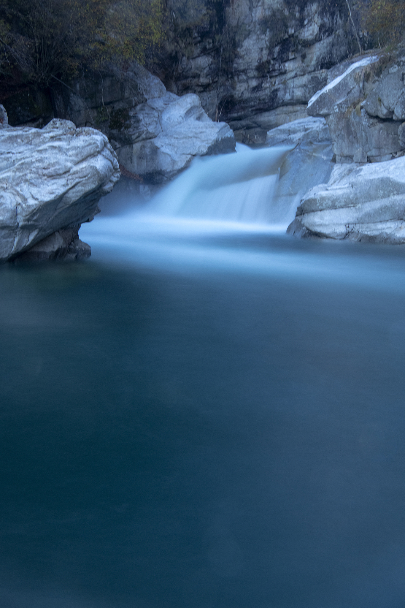 a waterfall in the alps in the uriezzo gorge, vertical pics and 