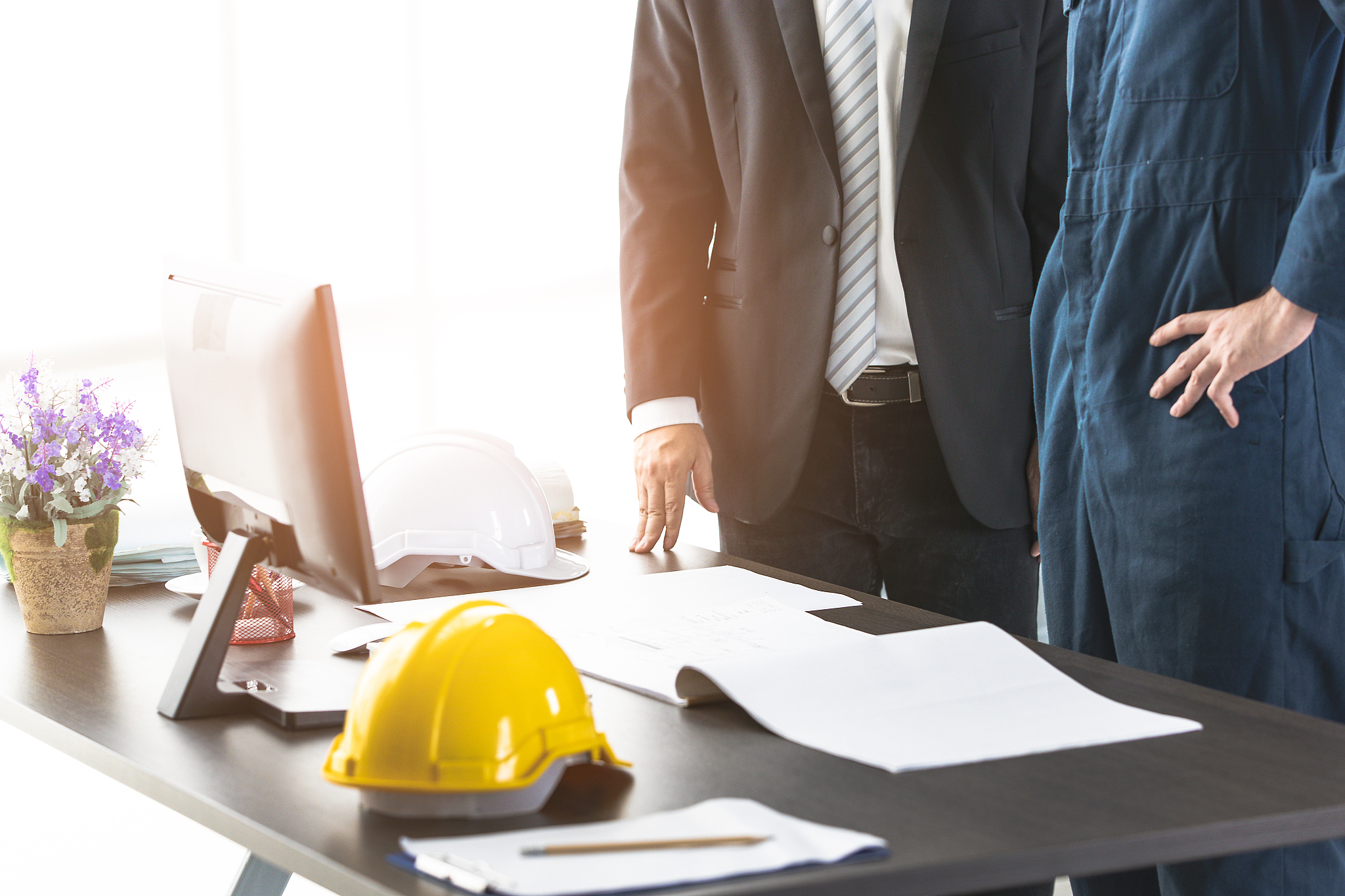 some people discuss about blueprint in office.